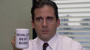 Image of The Office US Character Michael holding a mug stating World's Best Boss