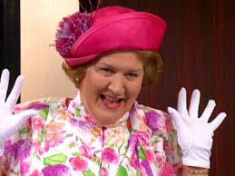 The character Hyacinth Bucket throwing up hands in joy from TV show Keeping Up Appearances