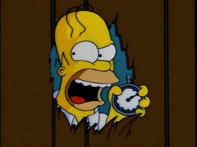 Parody of The Shining. Homer Simpsons face peering through door with stopwatch in hand