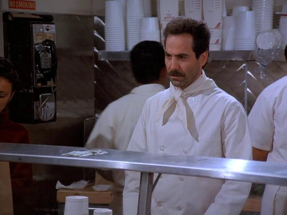 Character of the soup nazi (man in chef's costume) in Seinfeld.