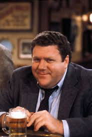 Norm from Cheers smiling for camera