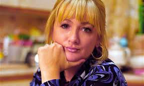 Denise Best nee Royle sat in the family kitchen looking miserable from the TV show The Royle Family