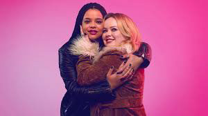 An image of the characters Eddie and Maggie hugging from the TV show Big Mood