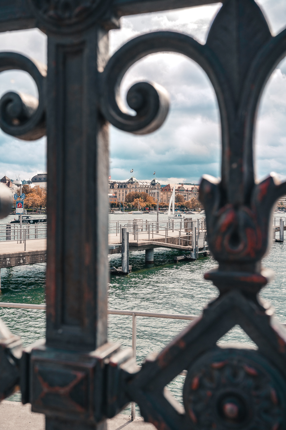 Sailboat on Lake Zurich view from Bürkliplatz in Zurich, Switzerland. Photo by Anson Tang.