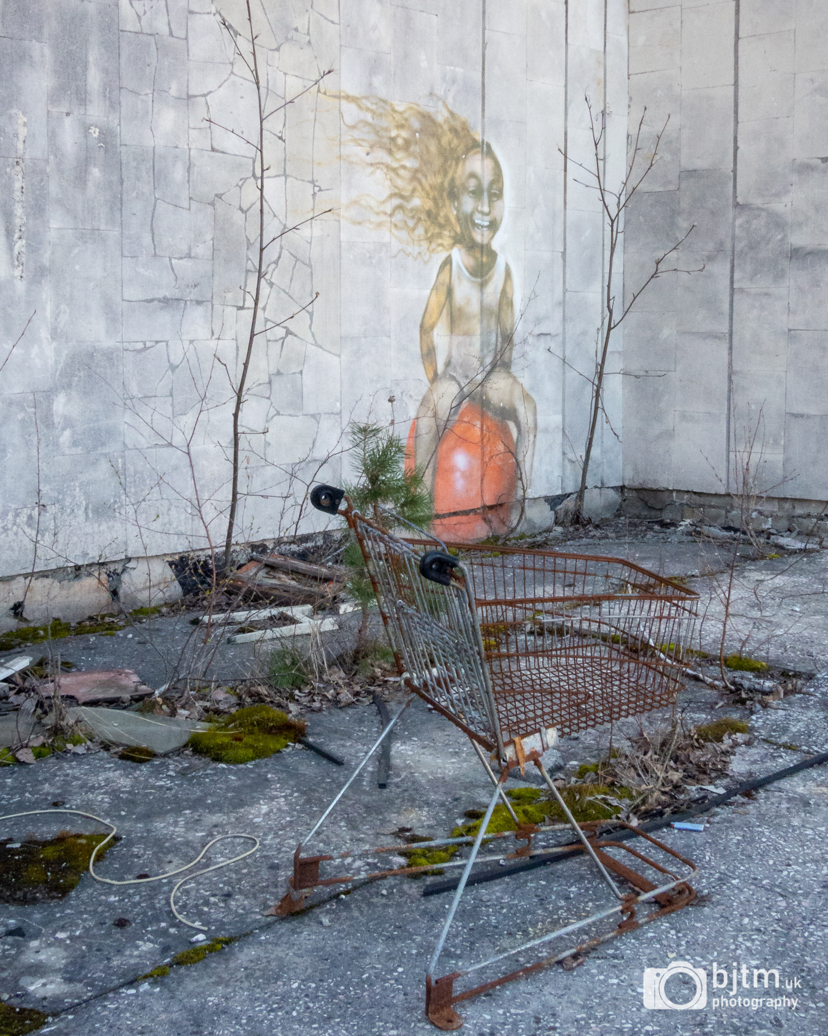 Graffiti and an abandoned trolley