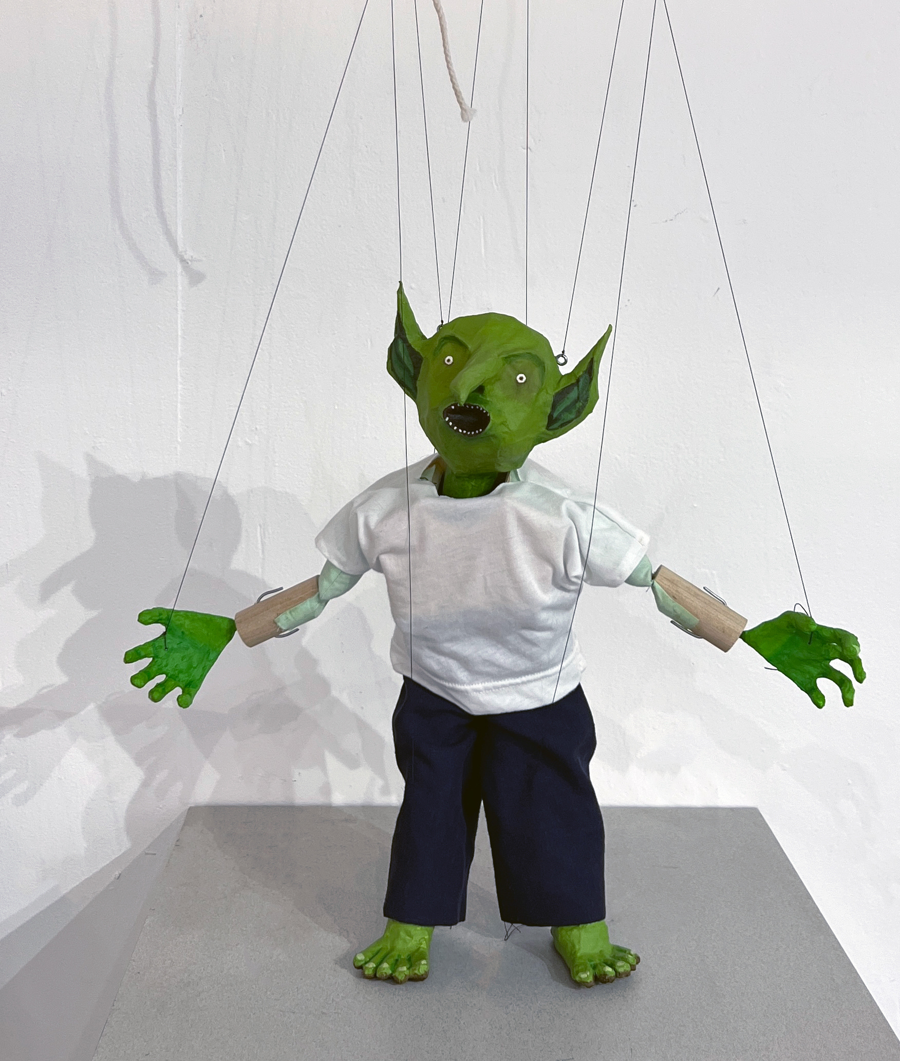 Suburban Goblin Puppet, paper mache, acrylic, wood, fabric, and string, 2022
