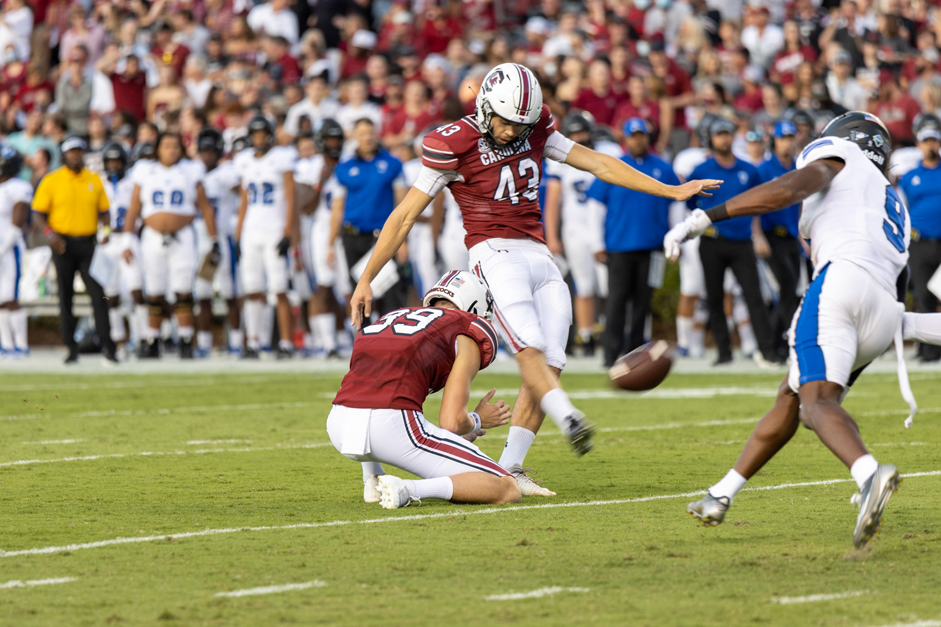Redshirt senior placekicker Parker White kicks a field goal. The additional point brought the Gamecocks' score to 15 at the end of the first quarter.