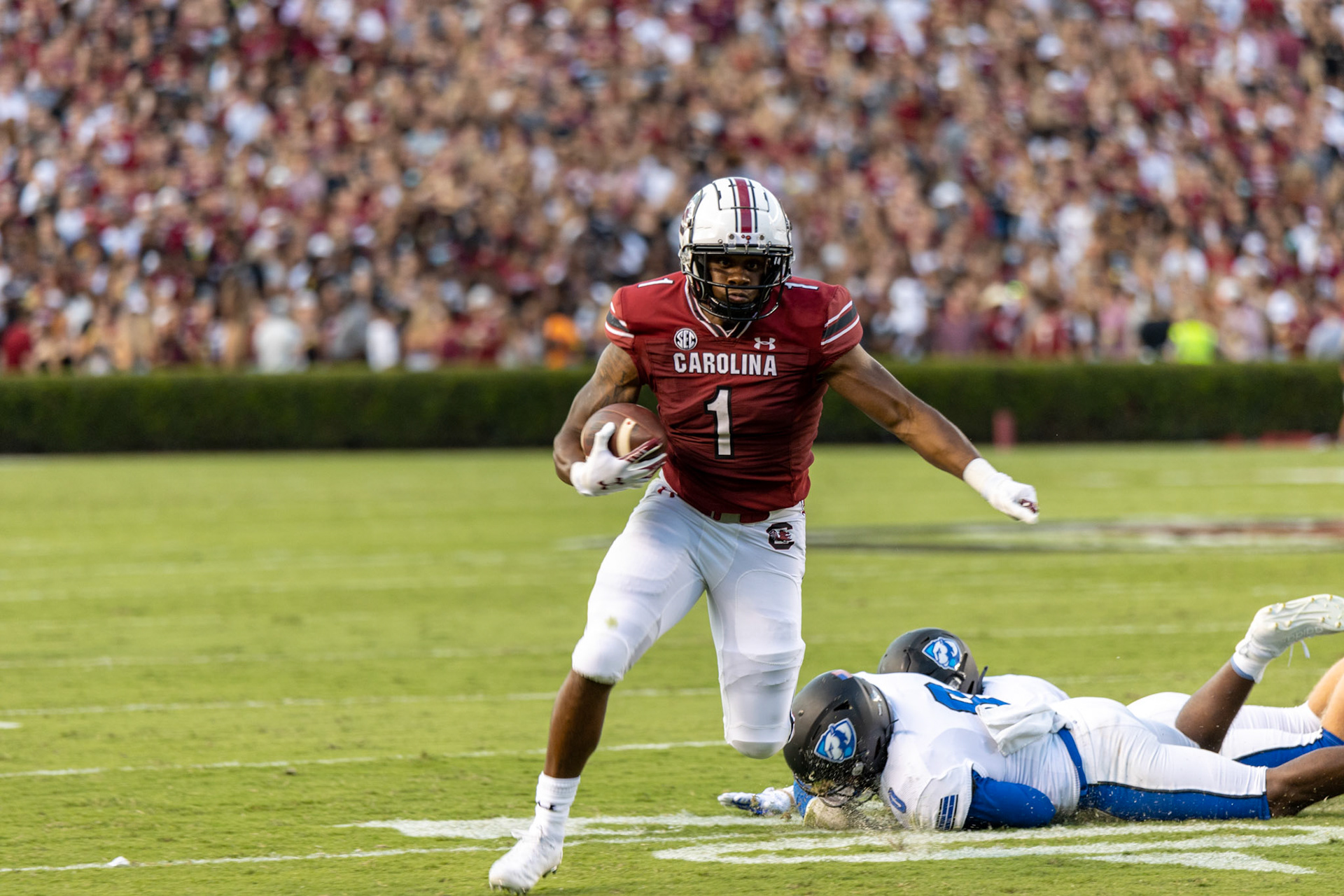 Redshirt freshman running back Marshawn Lloyd evades a tackle attempt made by an Eastern Illinois player. Lloyd made the first down for the Gamecocks.