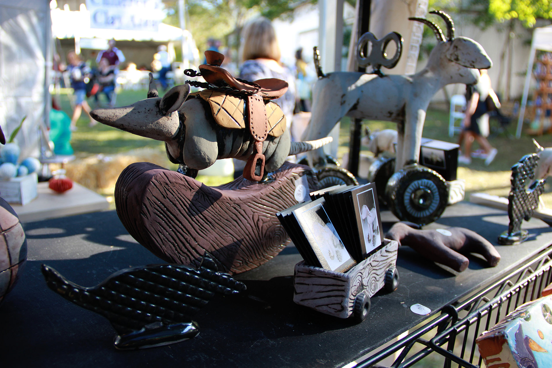 Betsy Evans’ armadillos and goats sculpture symbolize the power of resilience and perseverance.