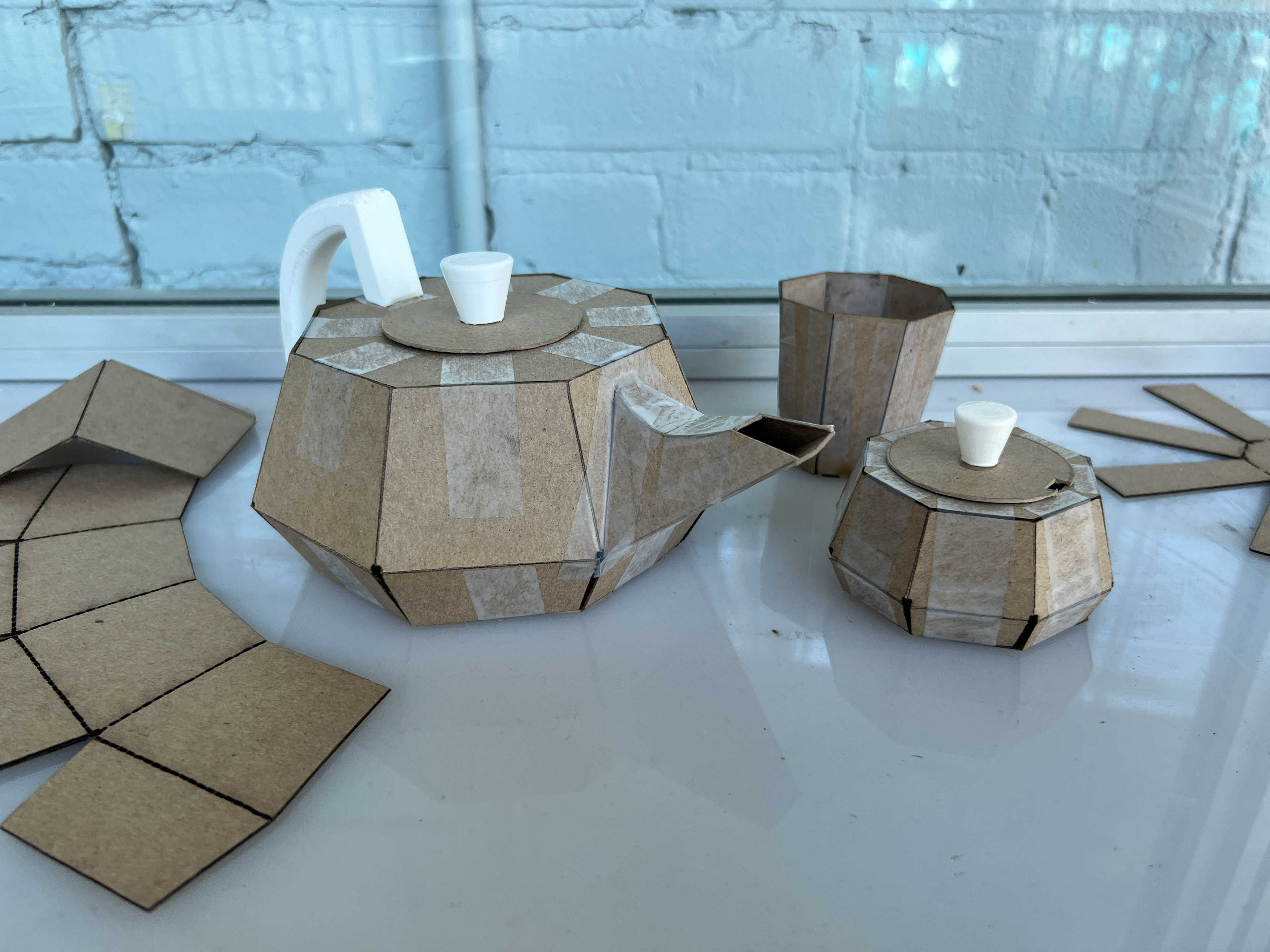 Chipboard prototypes with 3D printed parts. Full Scale