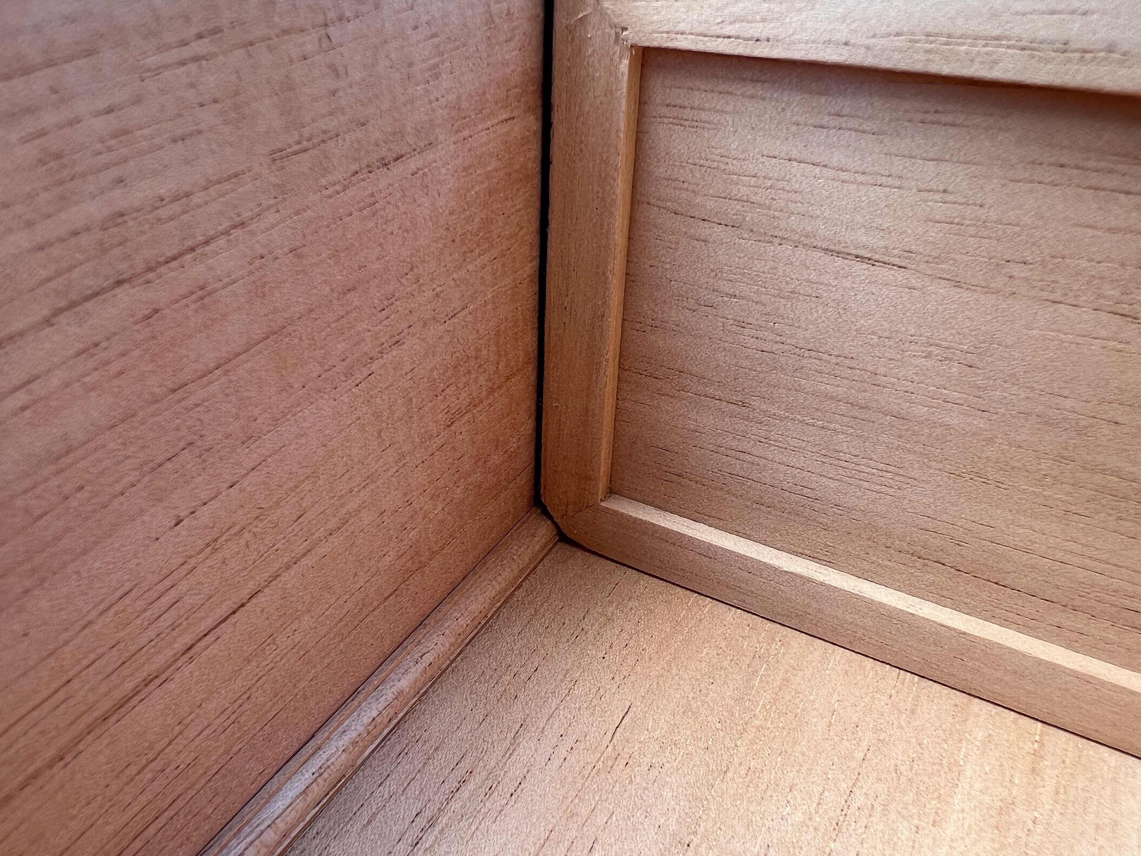 Quarter-Round in all bottom corners, dividers slide over