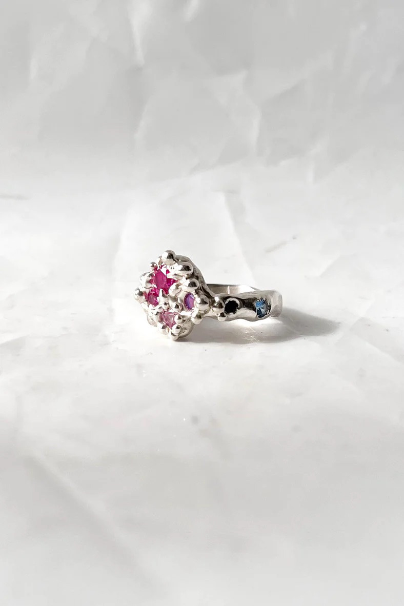 Nana Mary's Garden Ring, 2023. Recycled sterling silver, lab-grown sapphires, nano stones. Image courtesy of Crushes.