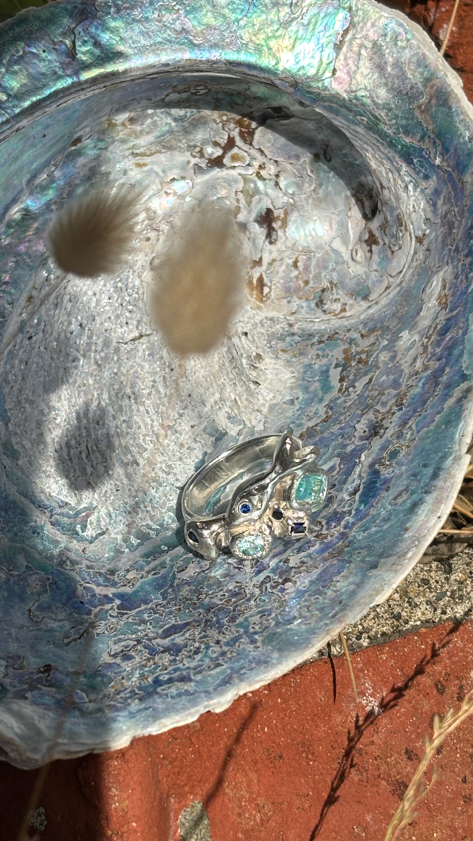 Melting Ring, 2024. Recycled sterling silver, lab-grown sapphires.