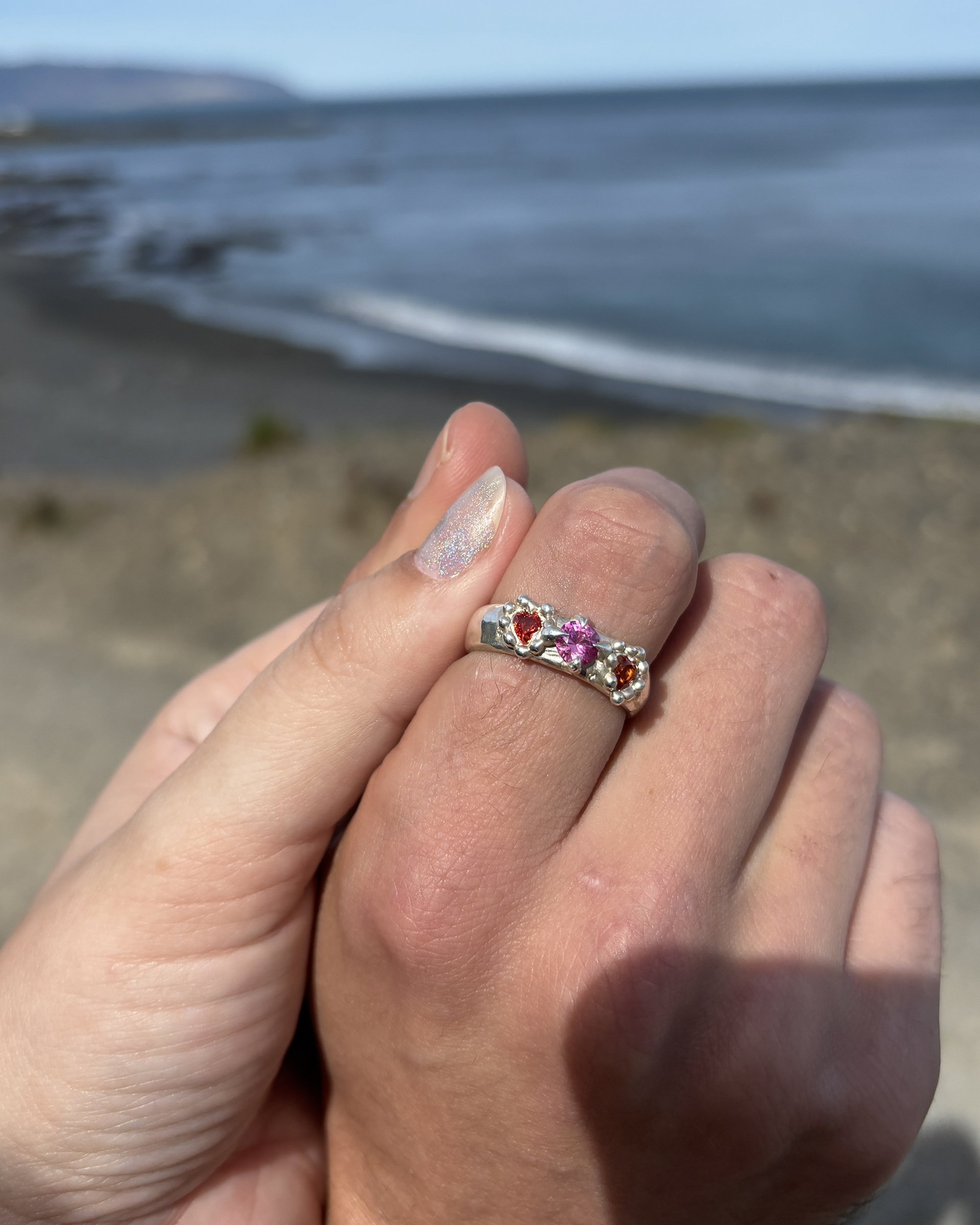 For Tom Ring, 2025. Sterling silver, lab-grown sapphire.