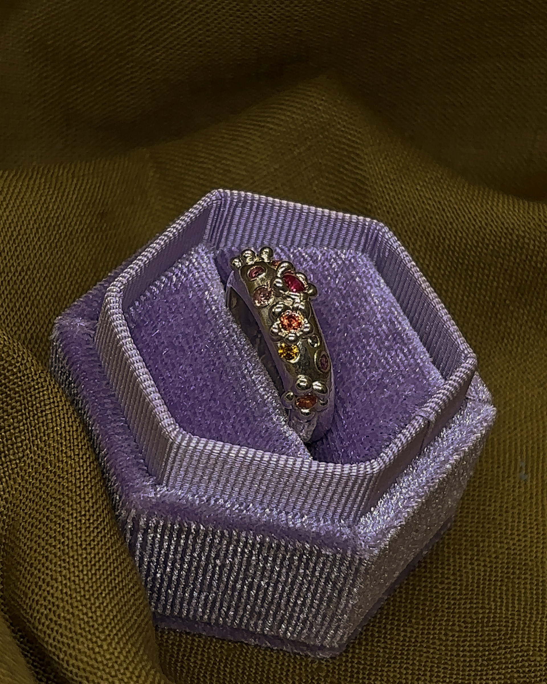 Garden Ring, 2025. Sterling silver, natural and lab-grown sapphire.