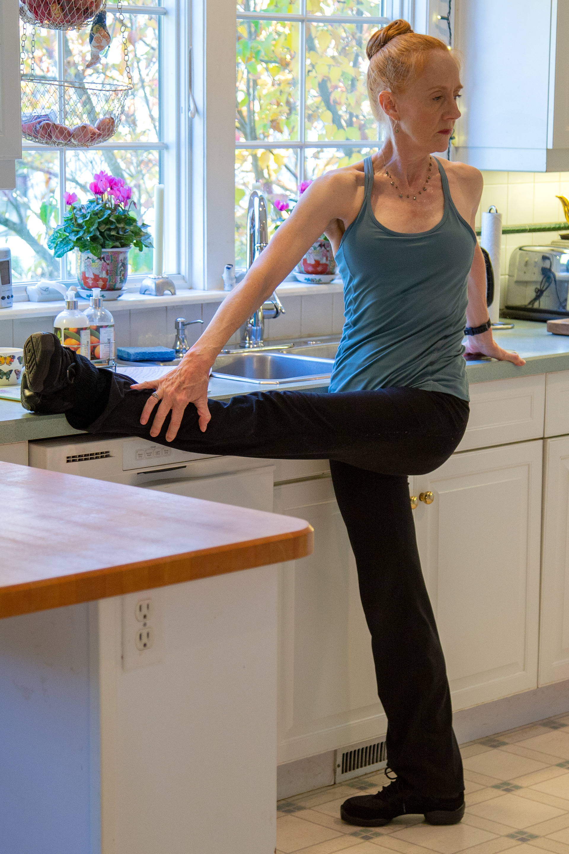 Stretching at the barre.