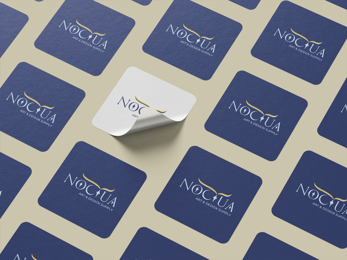 An arrangement of navy blue stickers with the Noctua logo, with one white sticker in the middle with the Noctua logo.