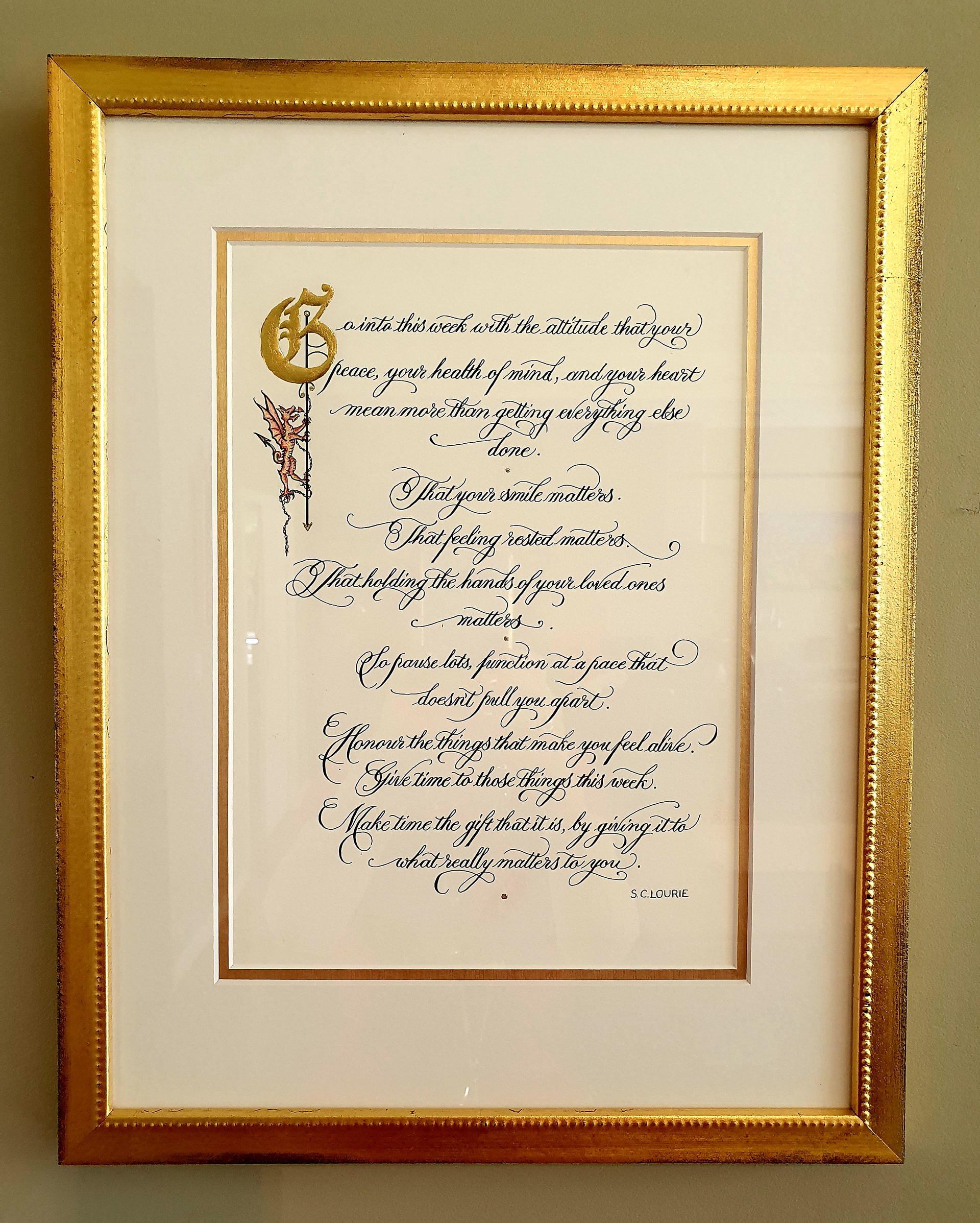 quote with 24 carat gold capital, with Welsh dragon, framed