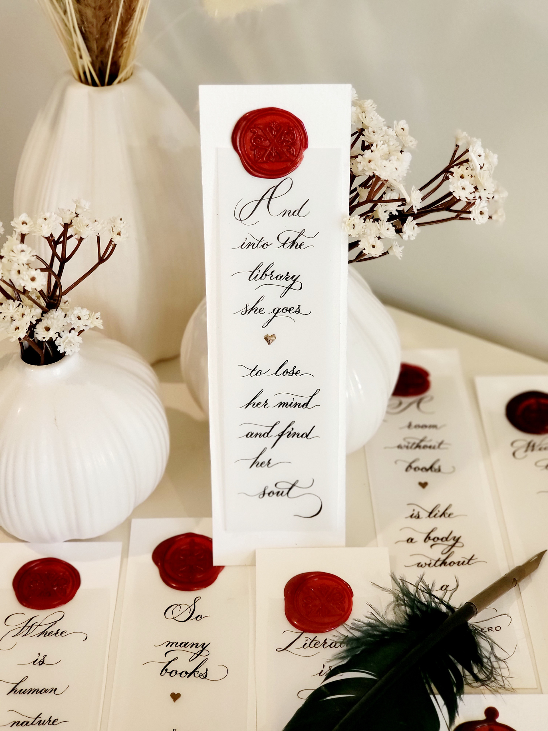 Bookmarks, ink calligraphy on vellum, sealed with a wax stamp