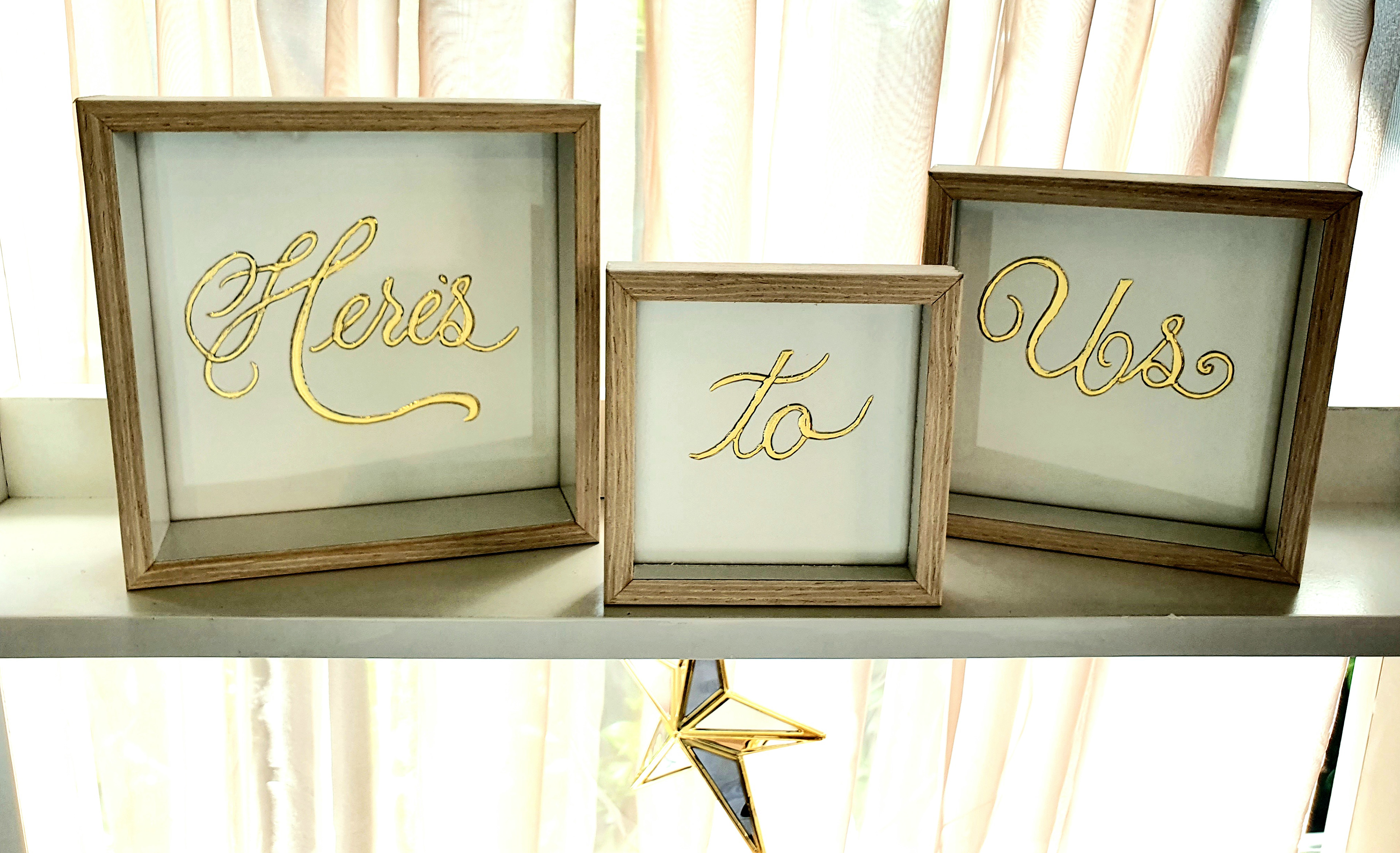 24 carat gold in a traditional Copperplate font, framed