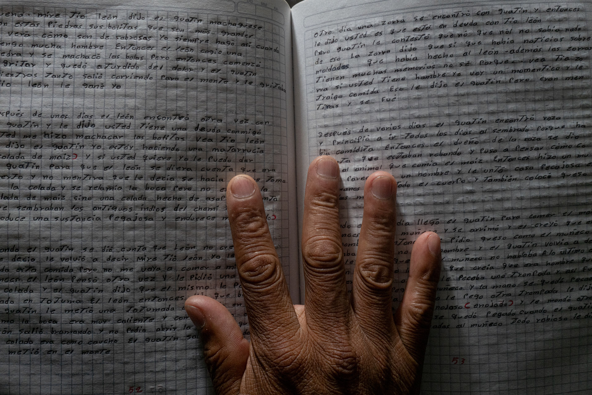Bogotà Colombia, August 2023Ancestral tales according to which emberachami families learn teachings are passed down verbally from generation to generation. Luis meticulously recopies all of them in a quatrefoil notebook. The family has collaborated with the University of Bogotá to document these writings.