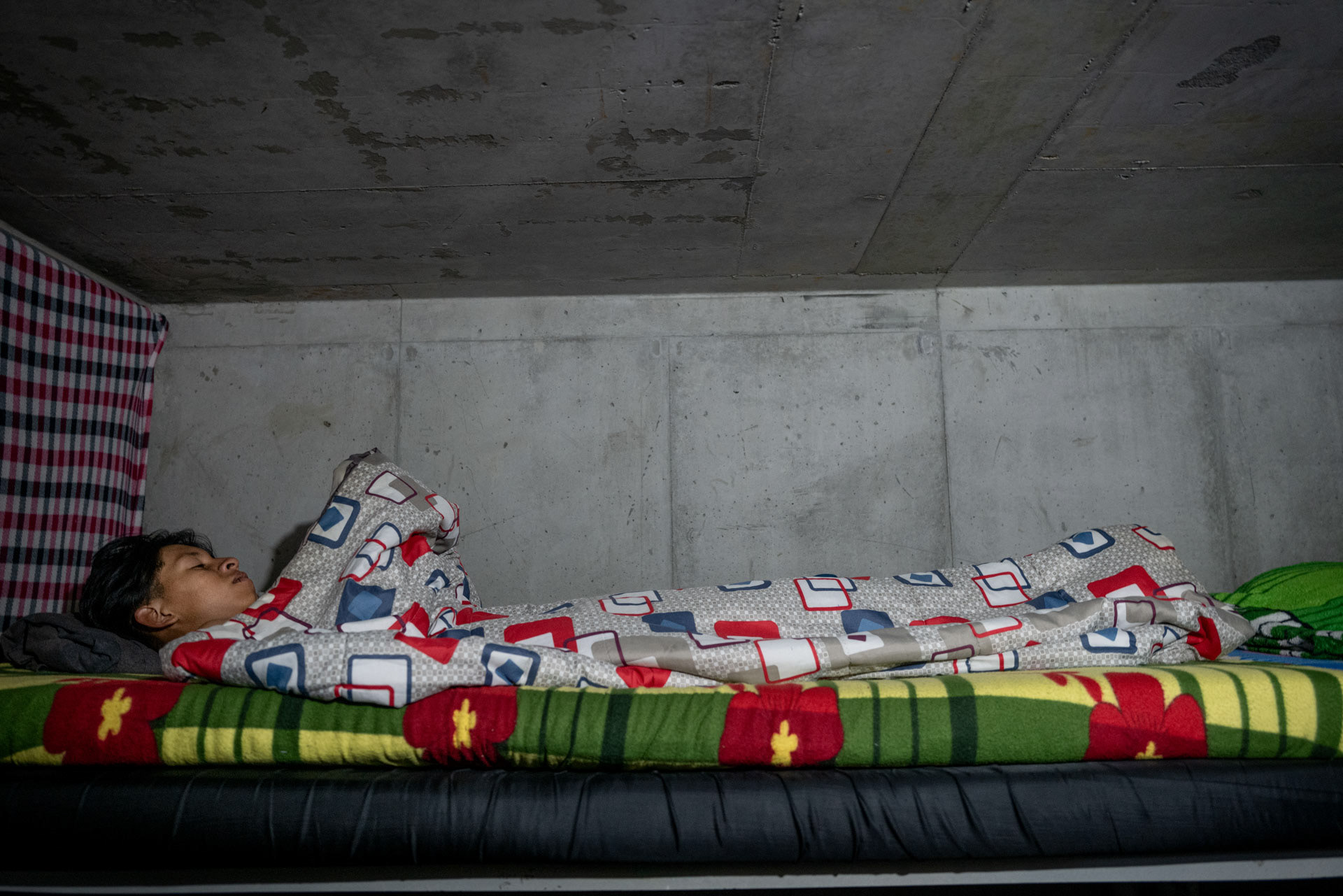 Bogotà Colombia, August 2023.John Esterin Dovigomen, 17, a rap enthusiast wants to enroll at the university, where he works as a volunteer, to help his family.