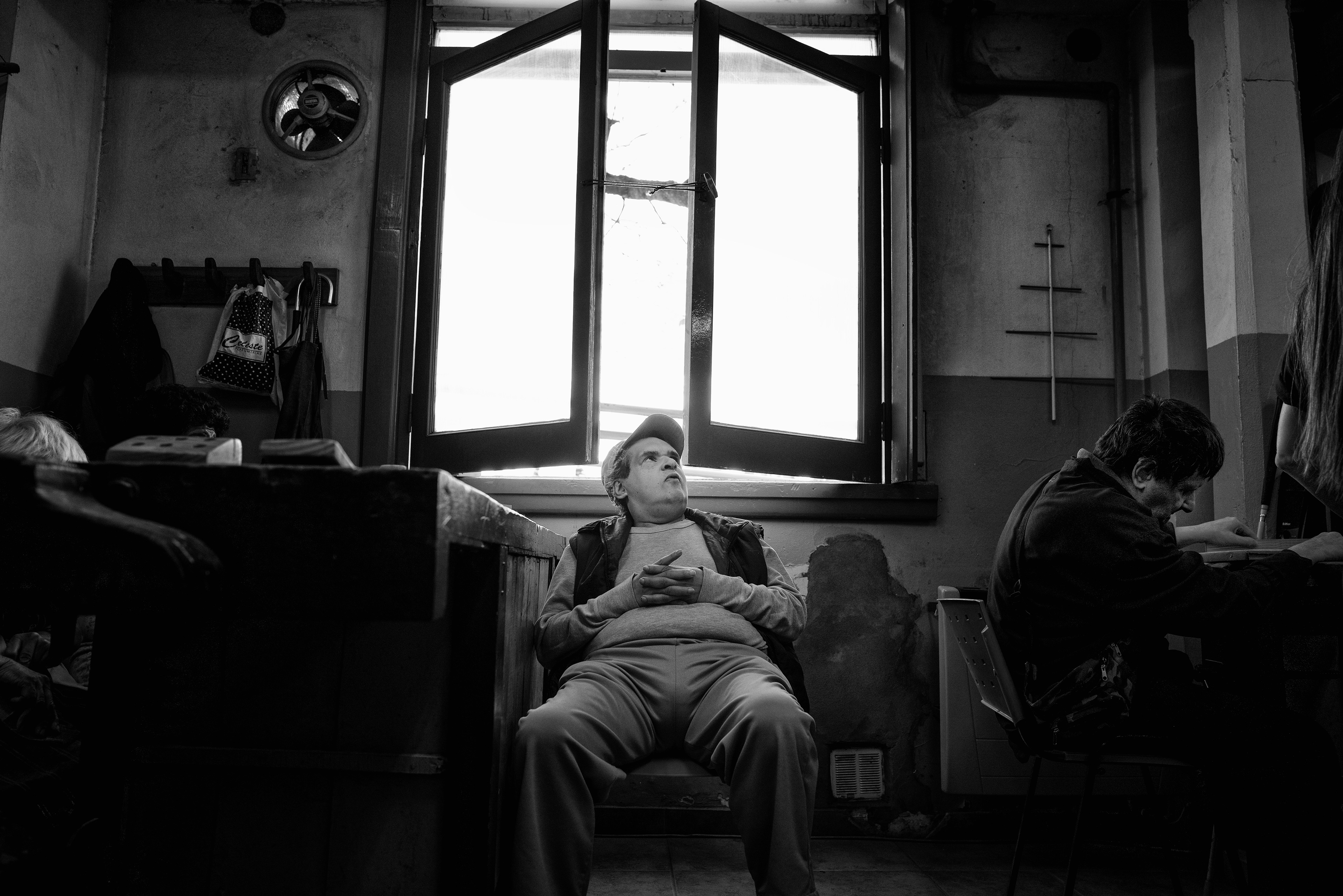 Buenos Aires, Argentina 2022. Daniel, blind and mentally ill, during the carpentry lesson, one of the many activities offered by the structure to develop autonomy and mentally therapeutic.