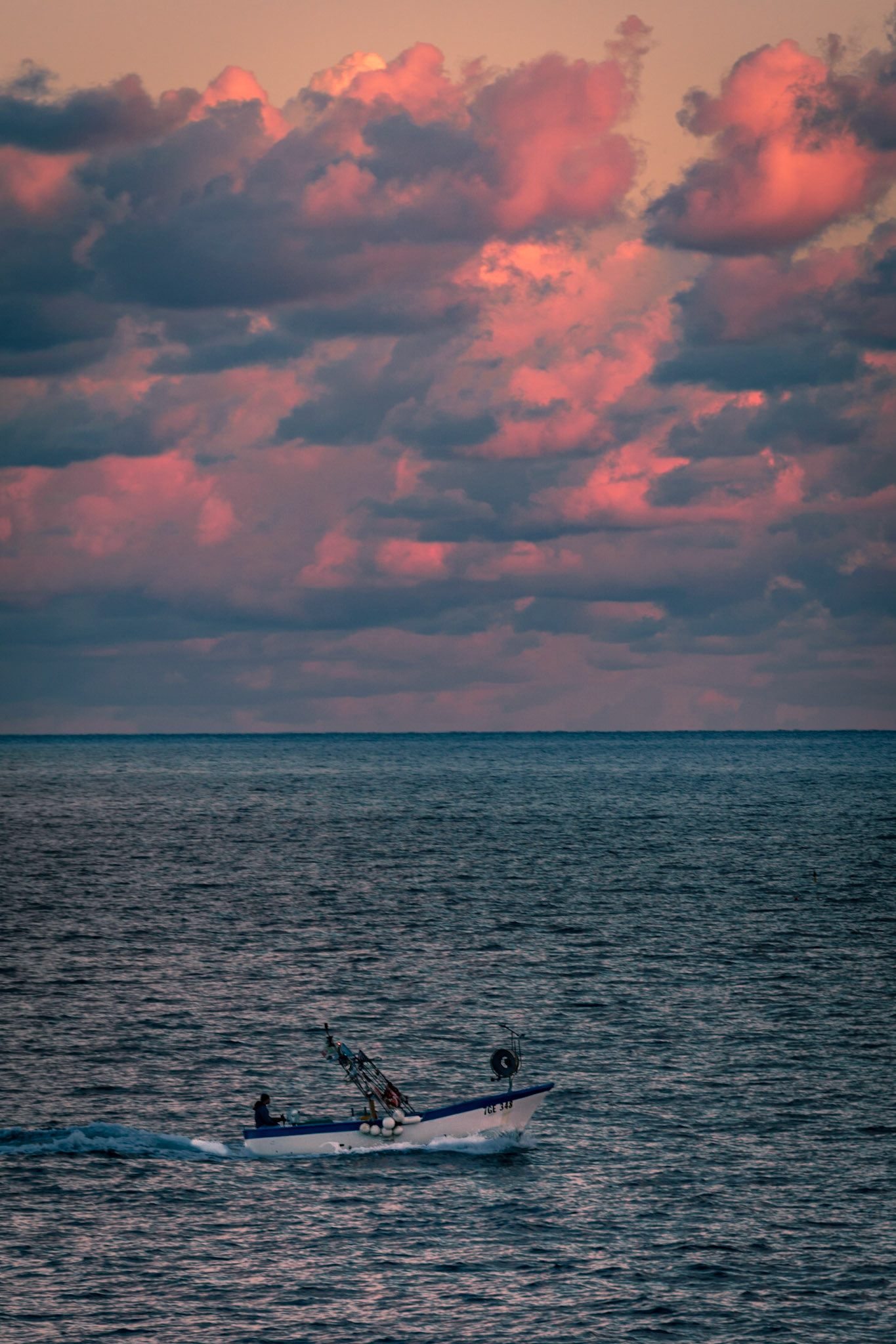 SUNSET AND FISHERMEN