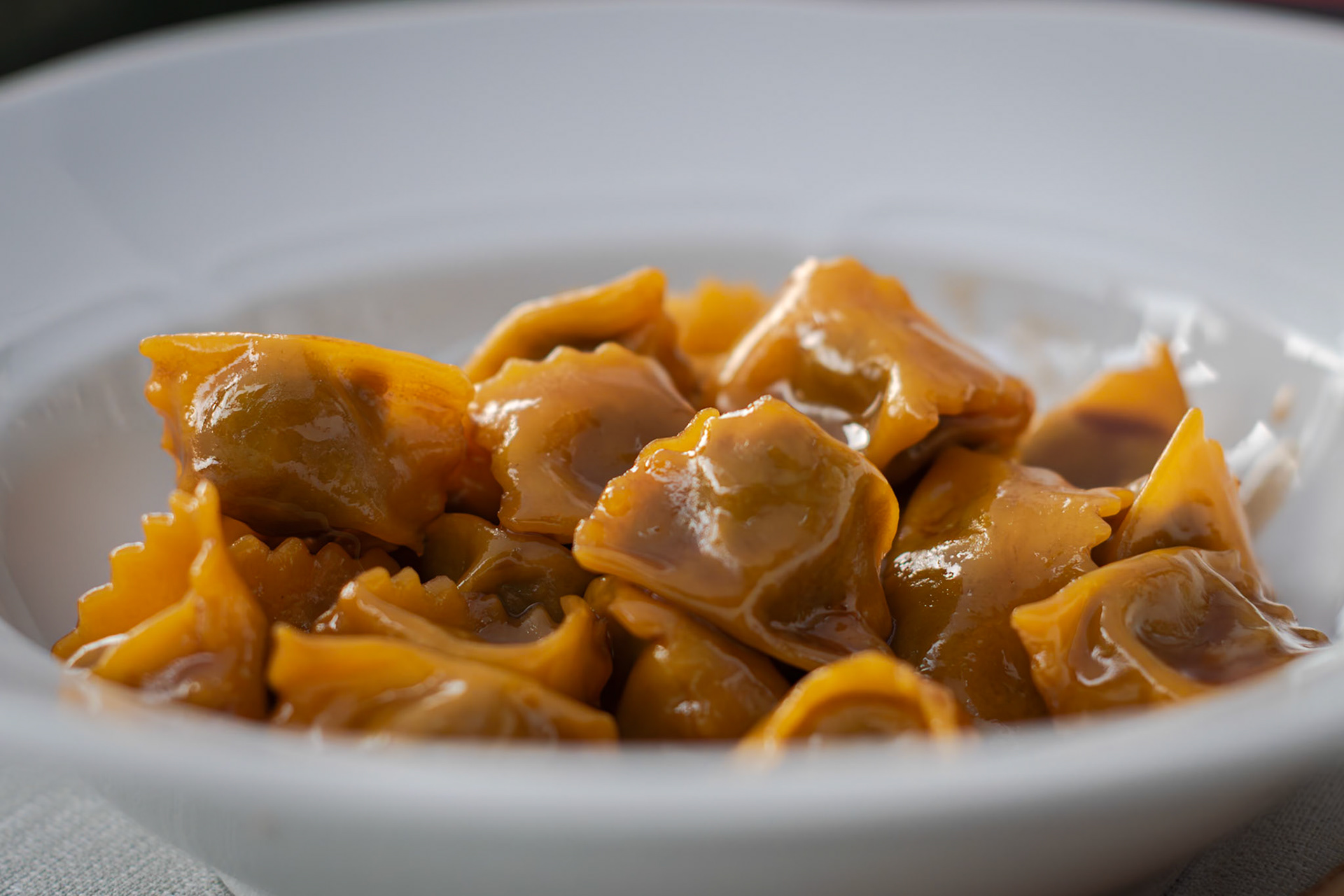 Ravioli del Plin al fondo d'arrosto.