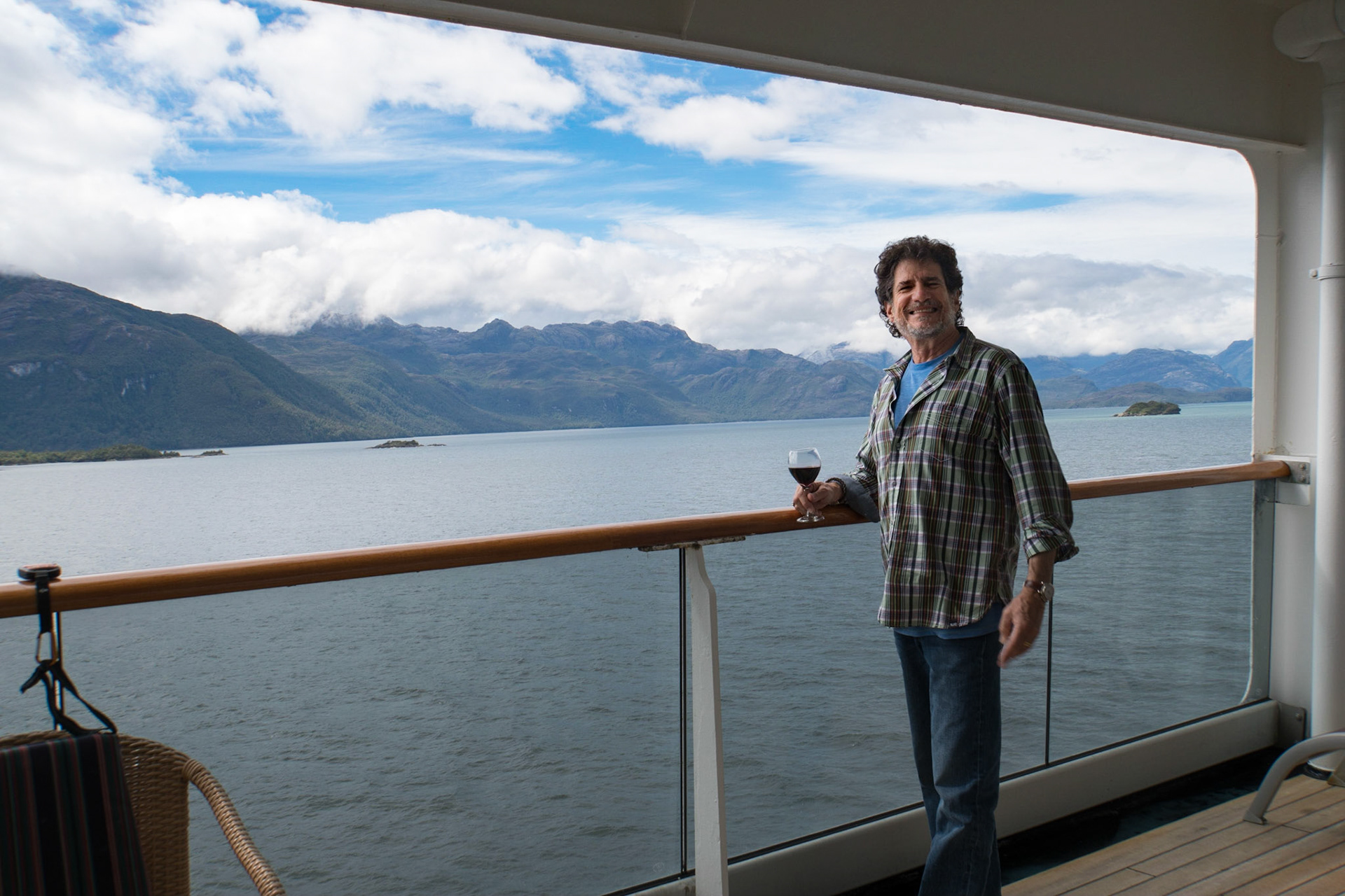 On our balcony as we are cruising thru the Fjords