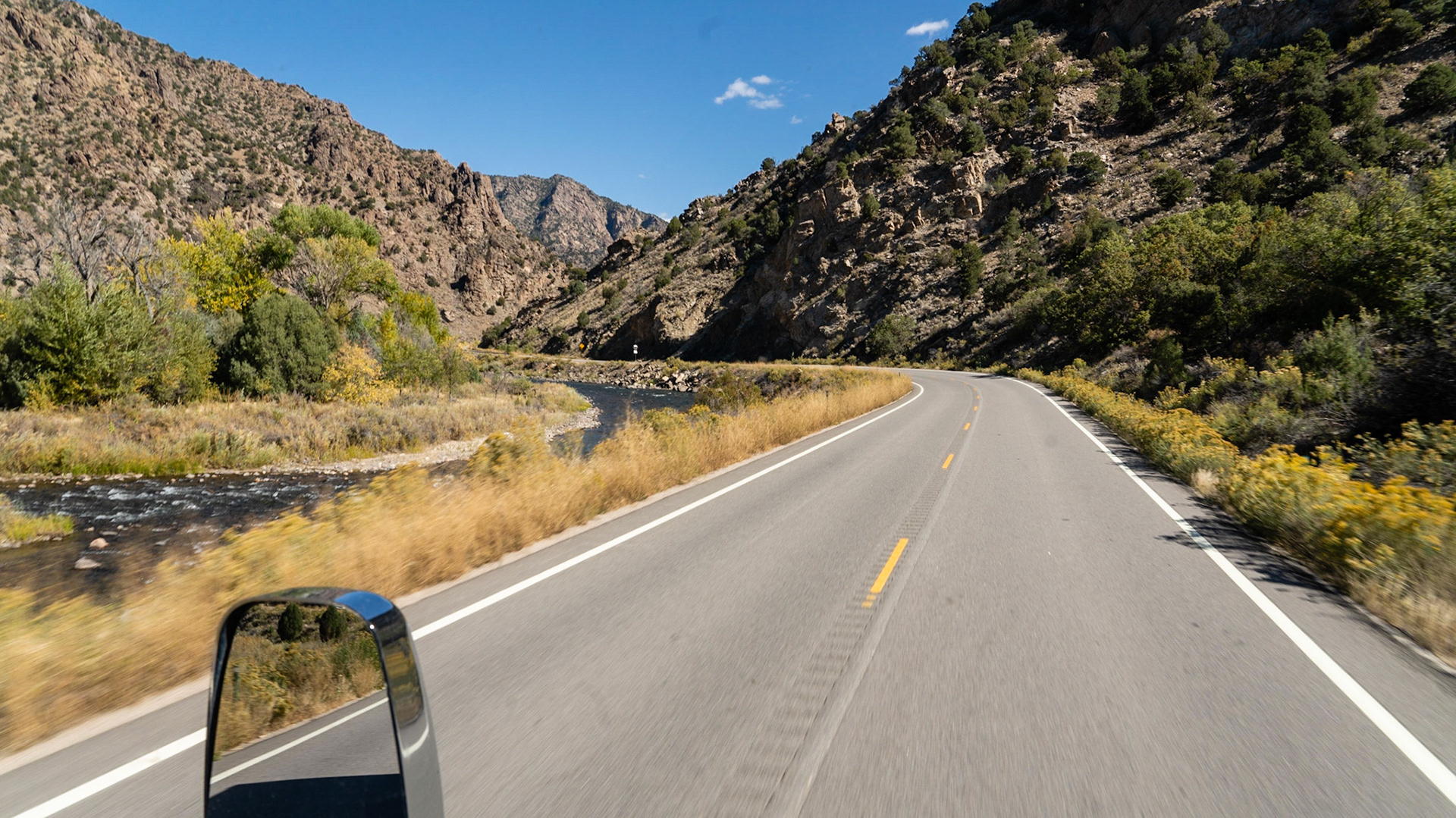 Curvy mountain road runs along the Arkansas River