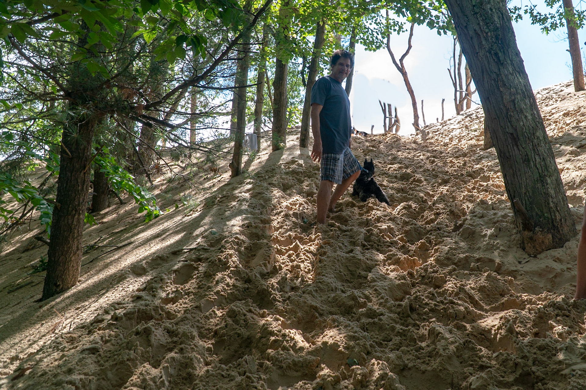 Climbing the dunes in Silver Lake State Park near Mears, MI