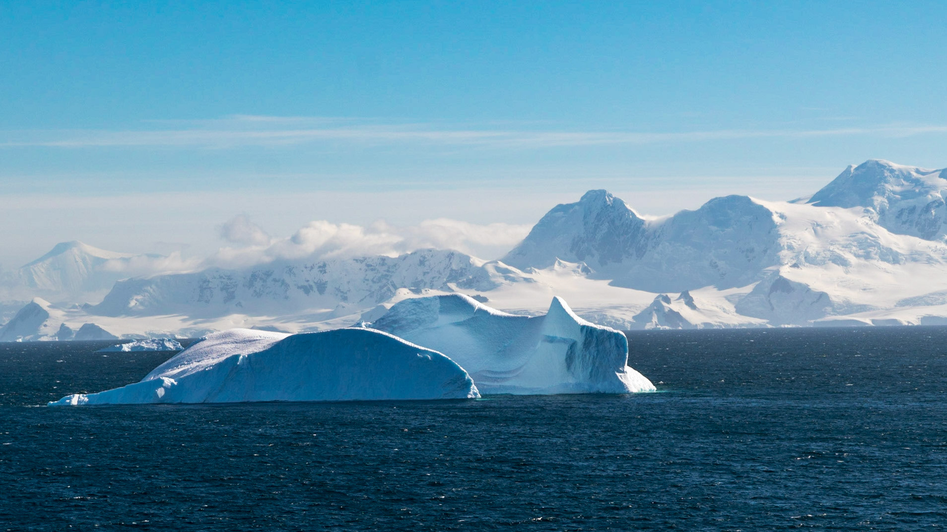 These icebergs capsized at some point because they are smooth on top