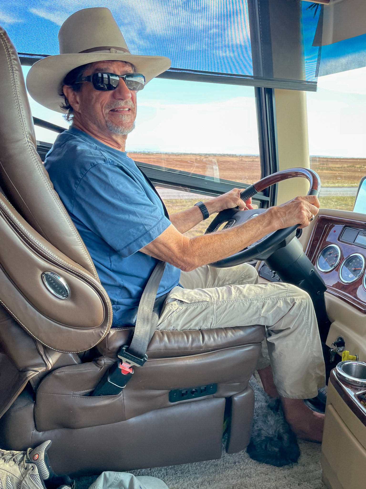 Tripp is relaxing under the seat as we drive to Ft Worth