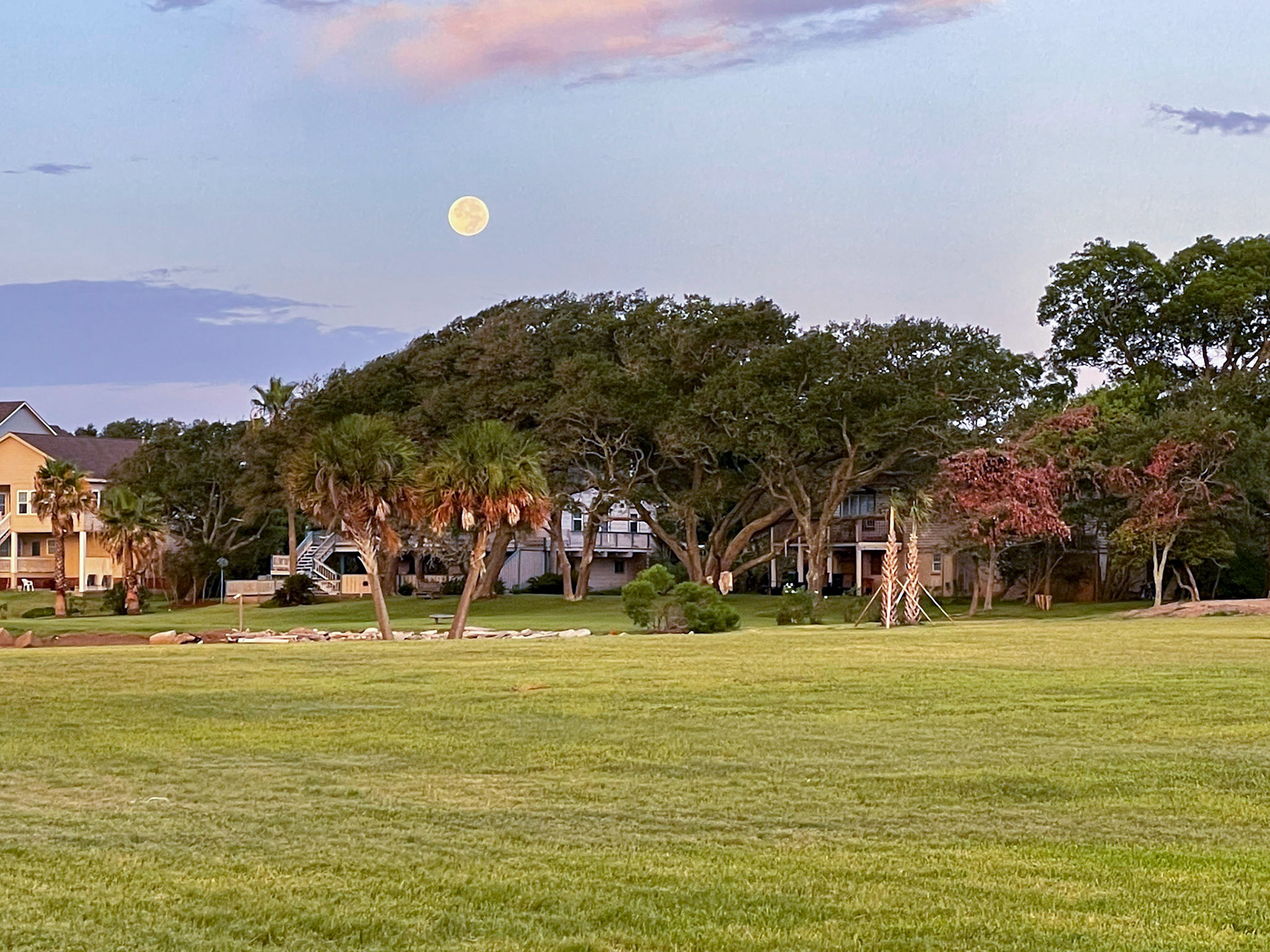 Full moon setting over the Seabrook house