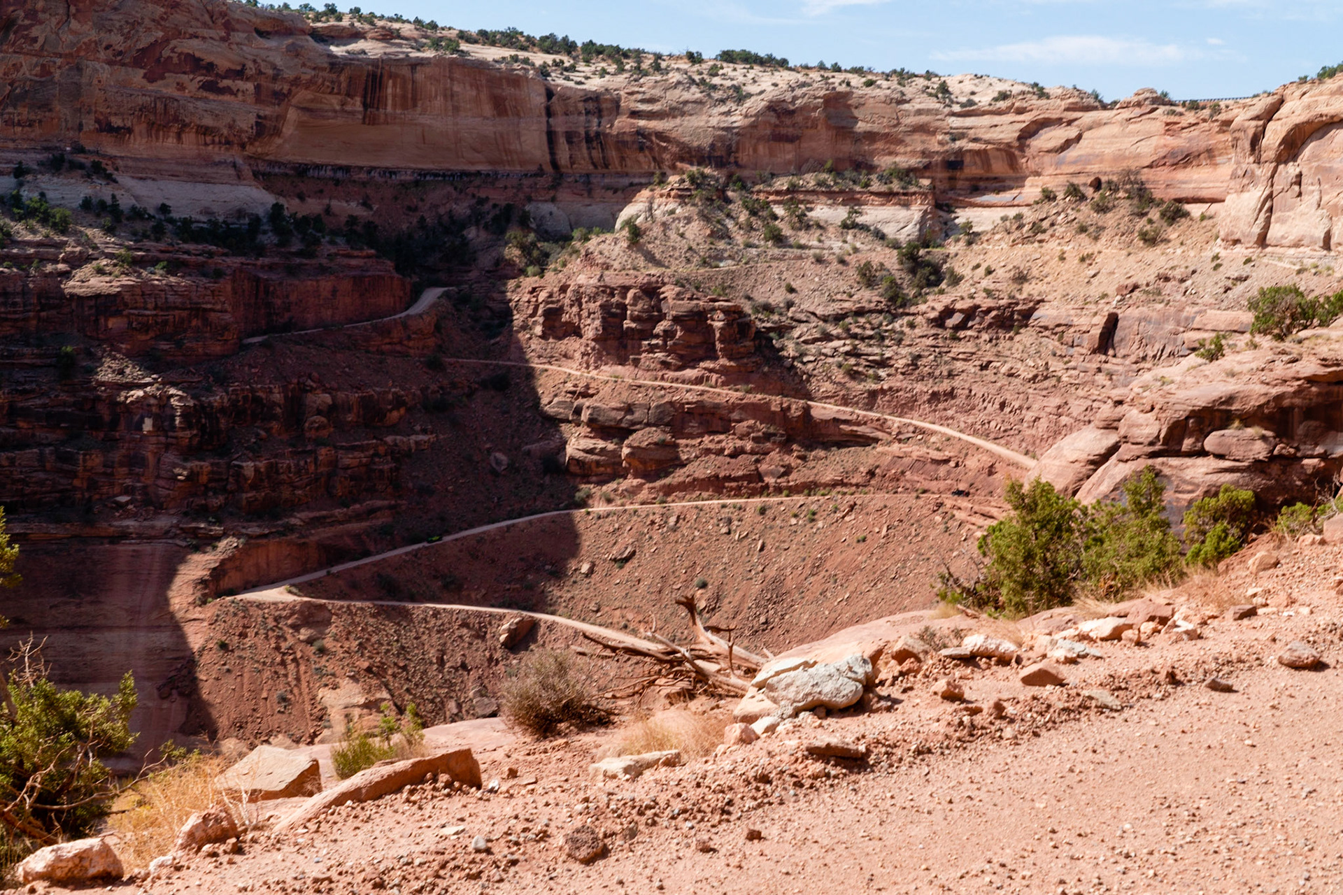 Switchbacks and steep drop-offs lead to the canyon floor