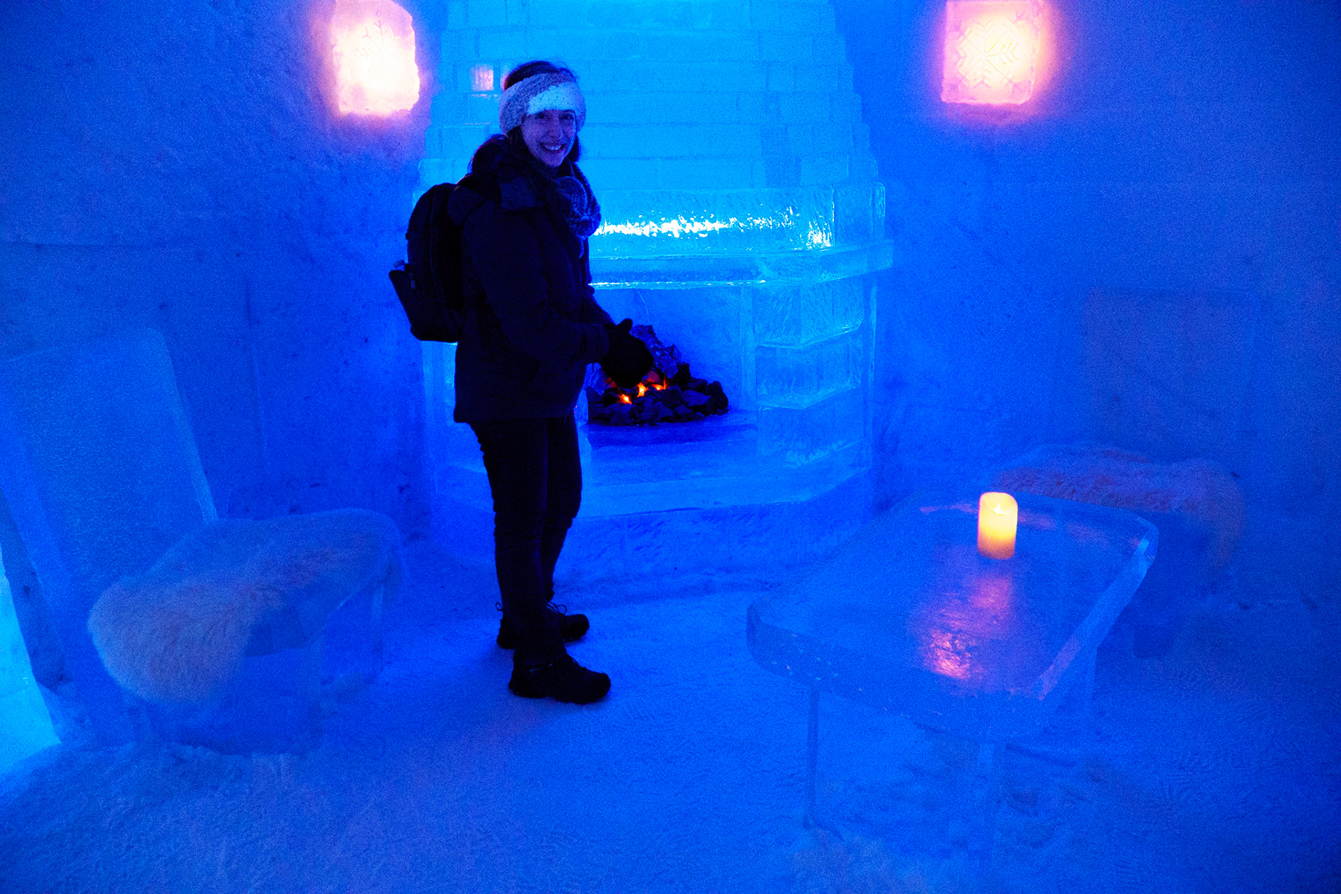 Warm up by the fire in the Ice Hotel