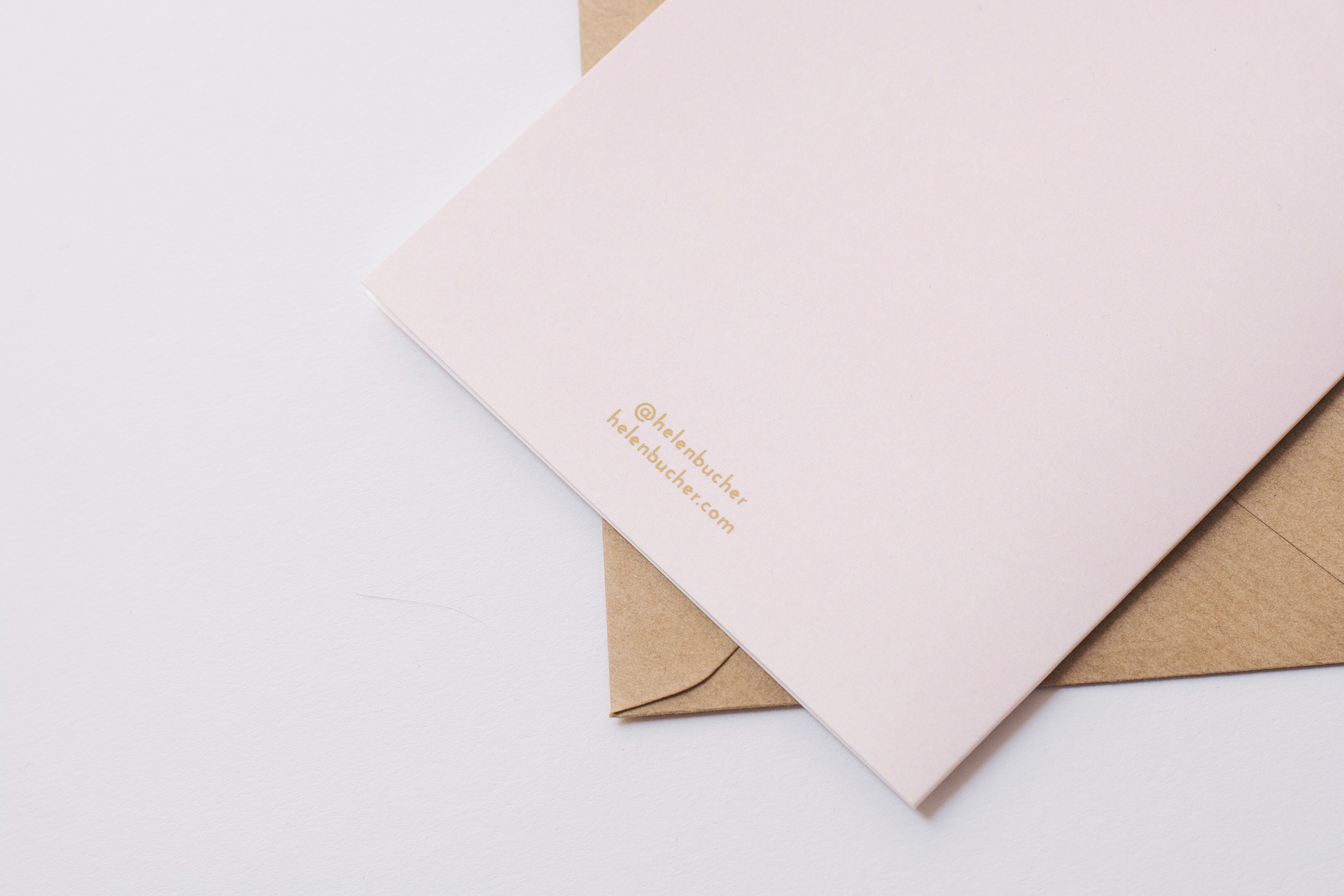 gold foiled artist information on the back side