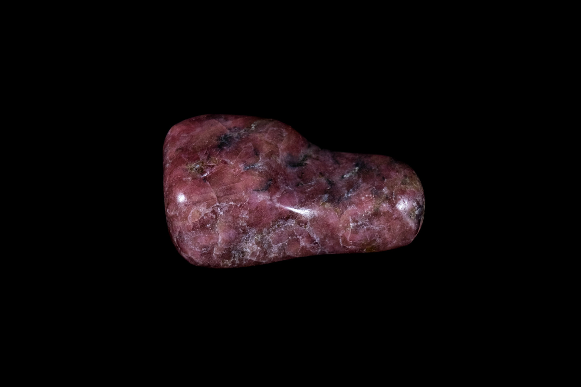 Pink Rhodonite Mineral on Black