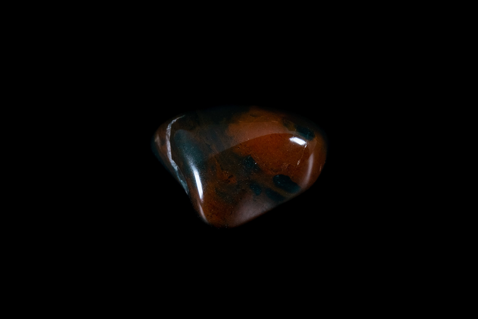 Red and Black Heliotrope Mineral on Black