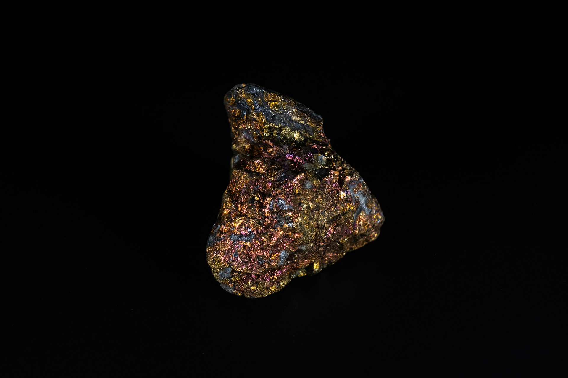 Raw Chalcopyrite Mineral on Black
