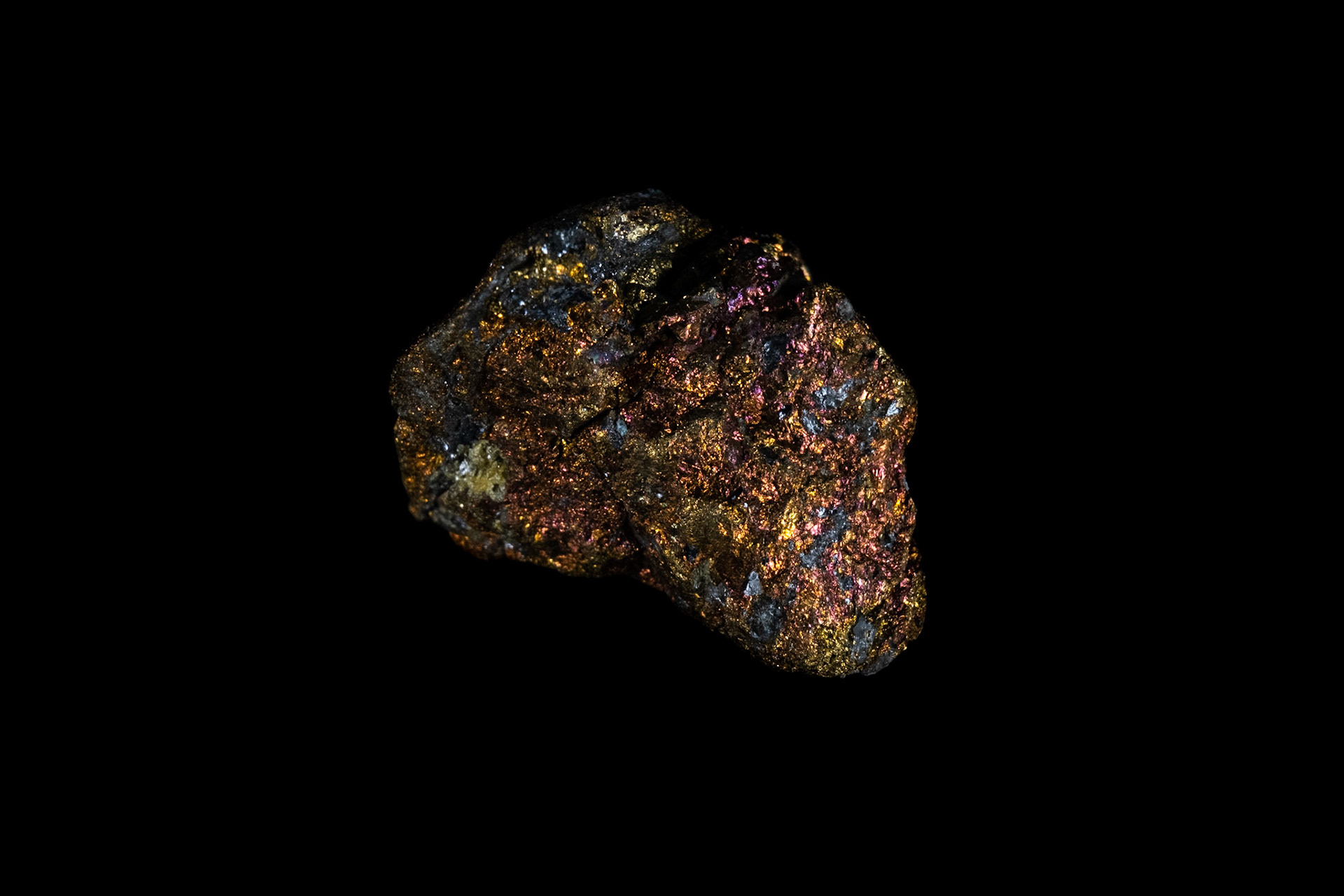 Raw Chalcopyrite Mineral on Black