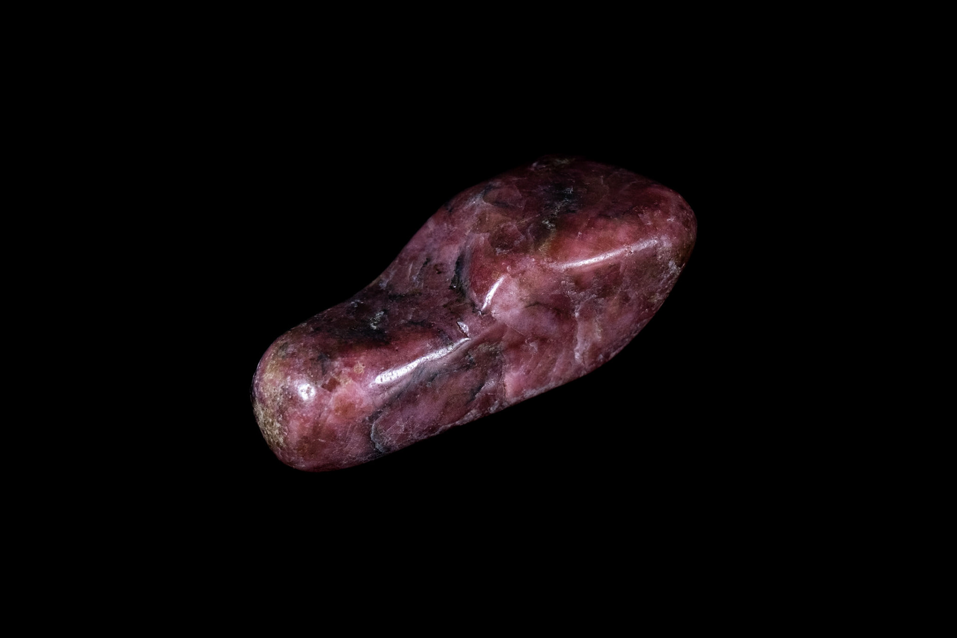 Pink Rhodonite Mineral on Black