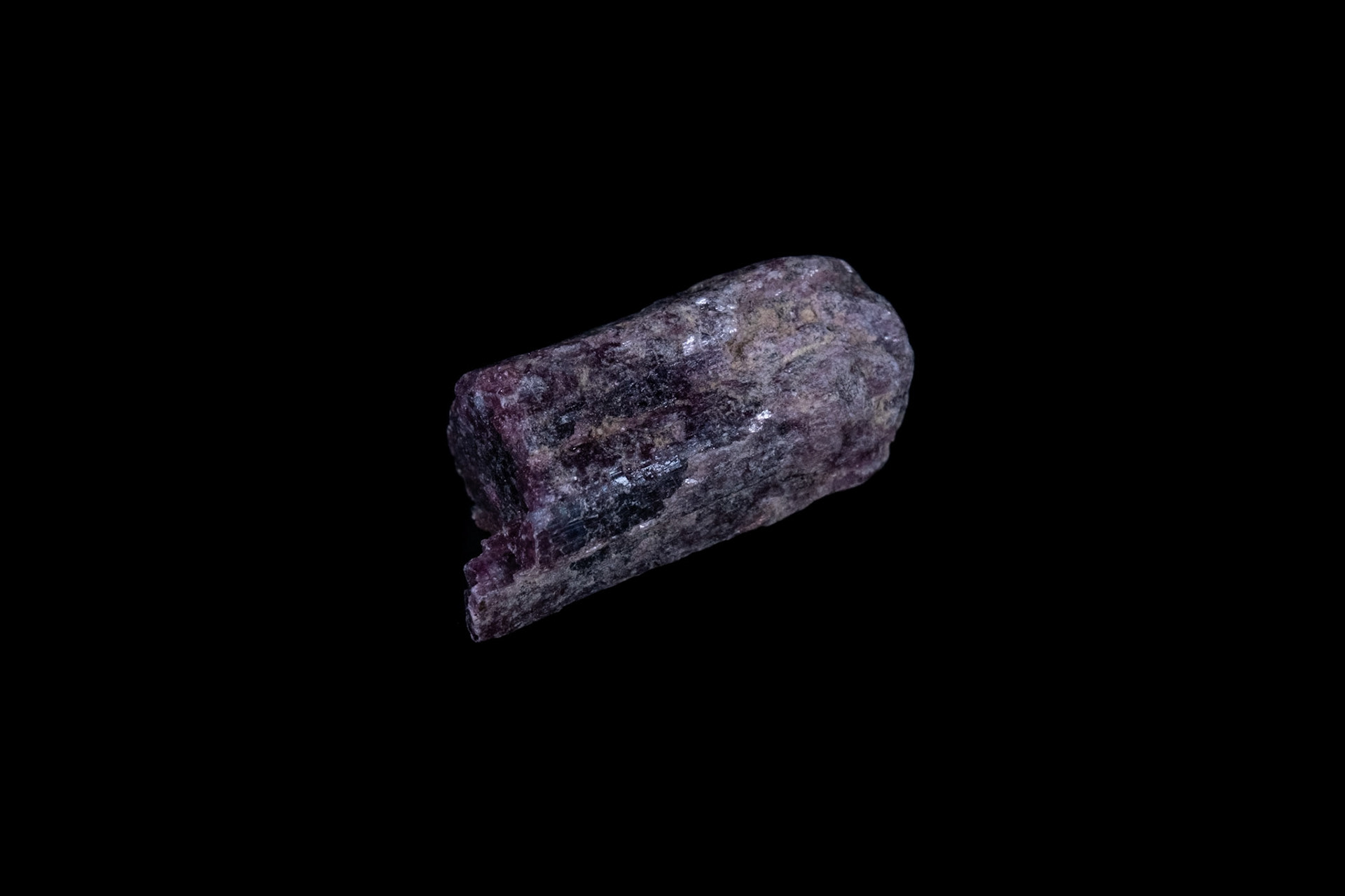 Red Tourmaline Mineral on Black