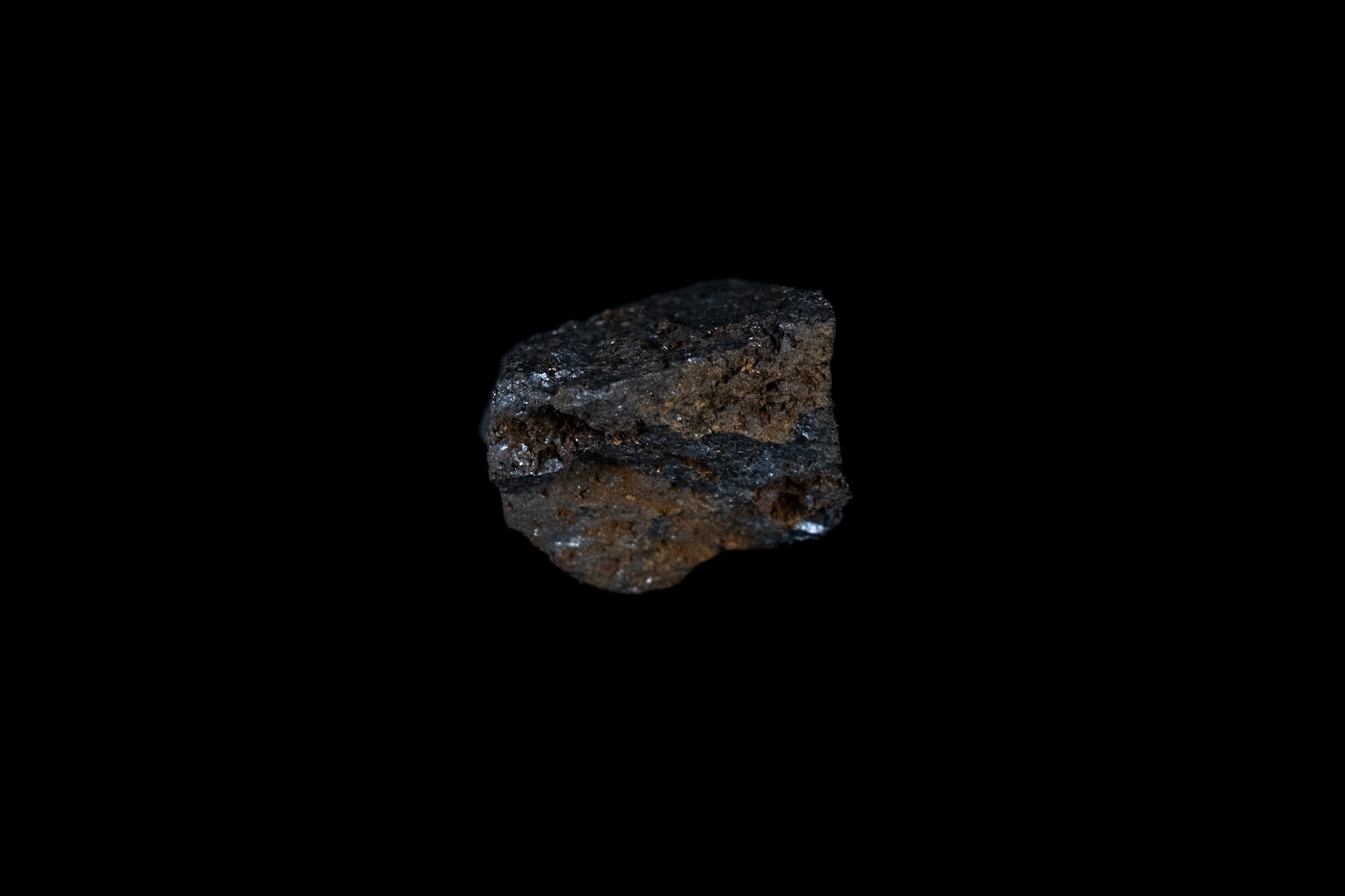 Dark Magnetite Mineral on Black