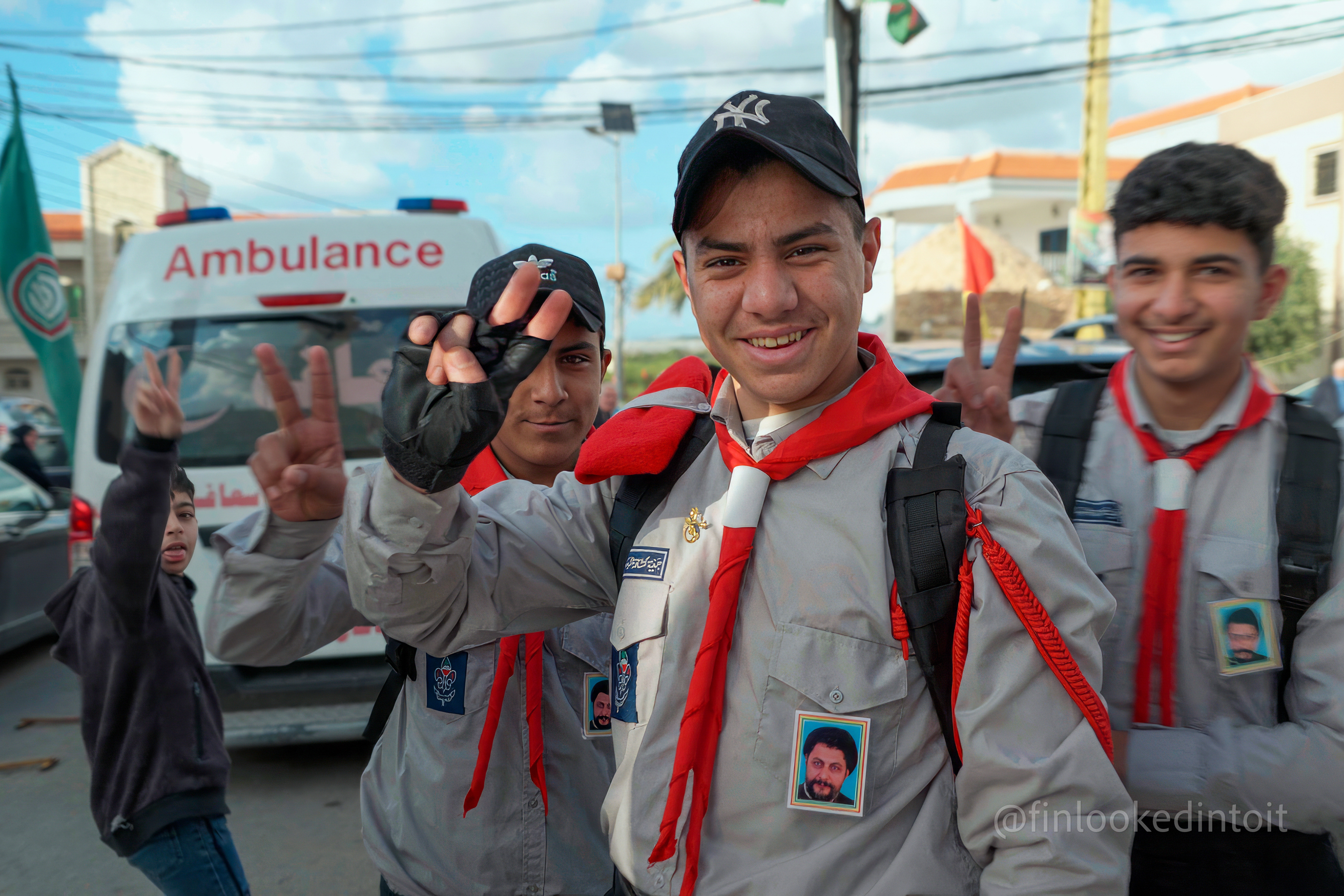 Teenage members of a youth organization connected to Hezbollah pose for a photo outside the funeral of a slain Amal Movement fighter, Southern Lebanon, 04/30/2024