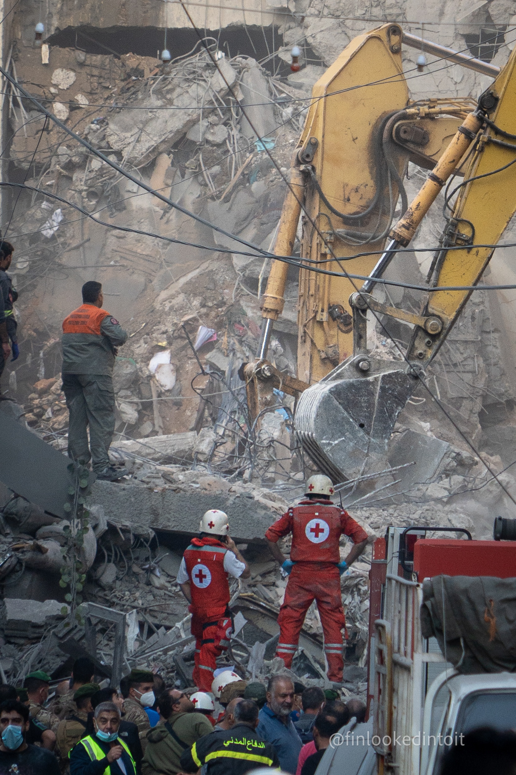 Emergency crews sift through the rubble of an airstrike in Basta, central Beirut, 11/15/2024