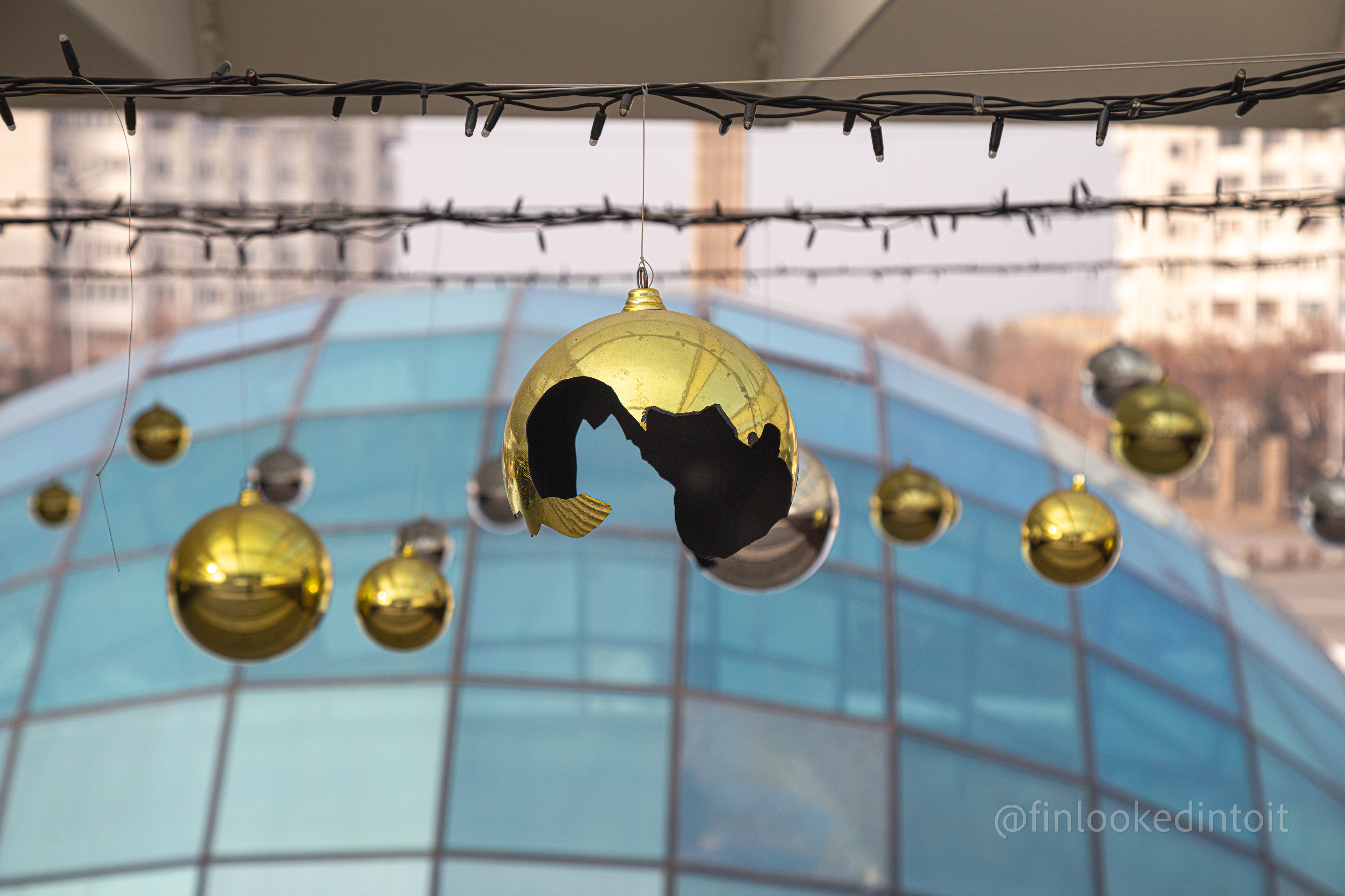 Christmas decorations blown apart by gunfire on the steps to the city hall in Almaty, Kazakhstan, 01/31/2022