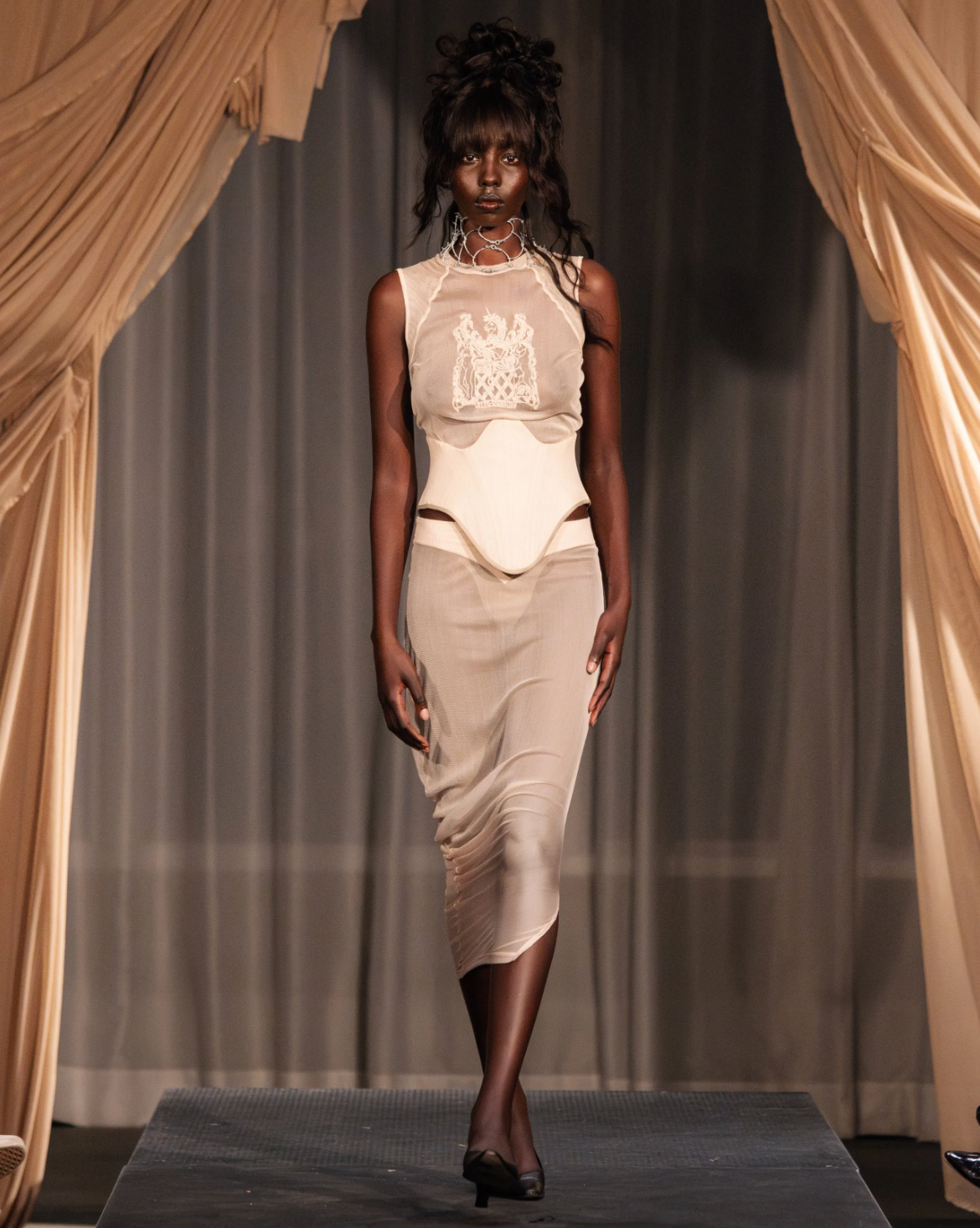 Andrew Curwen AW 26 - Dressing for Mo Johnson