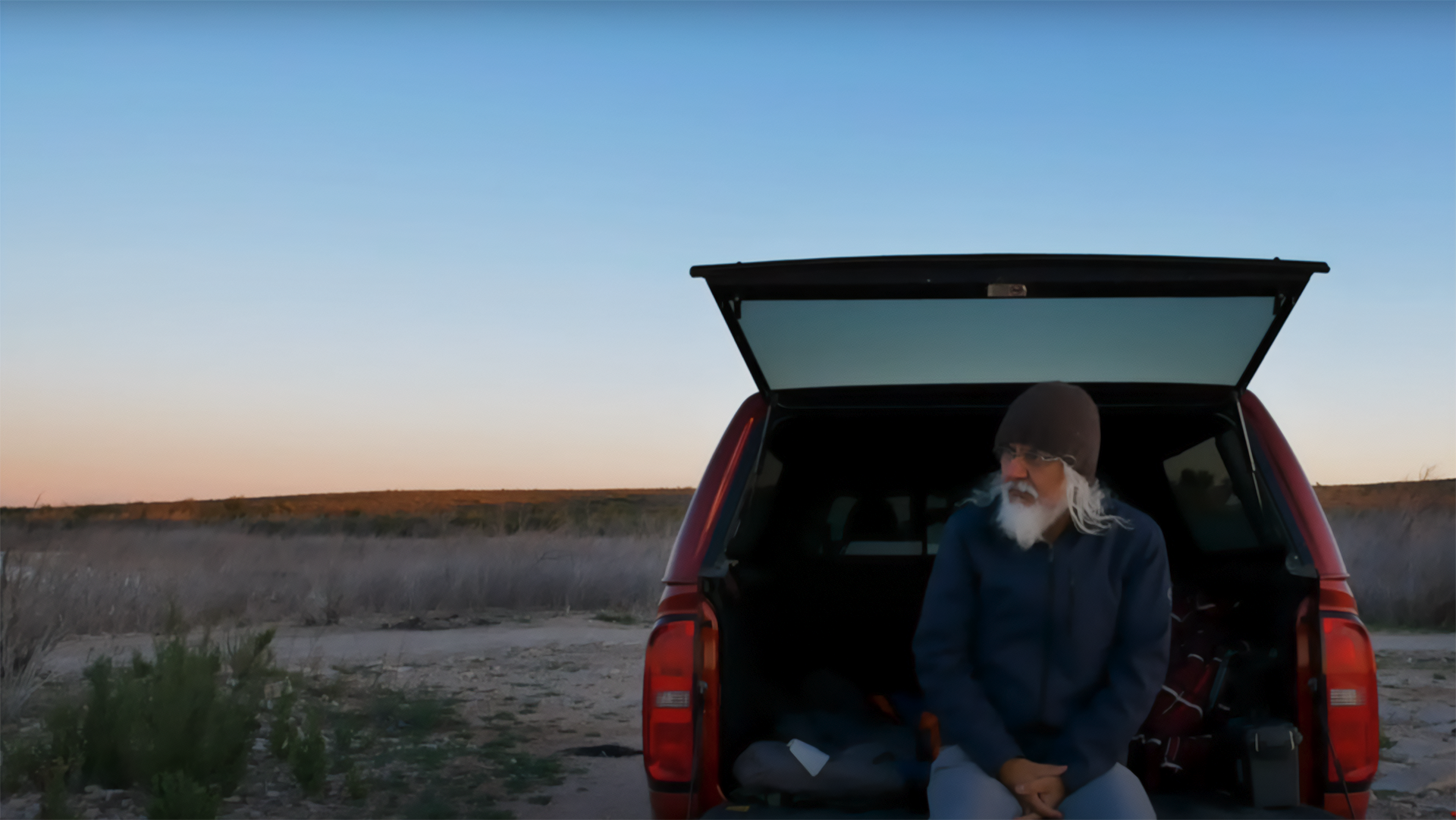 Solo truck bed camping in New Mexico.
